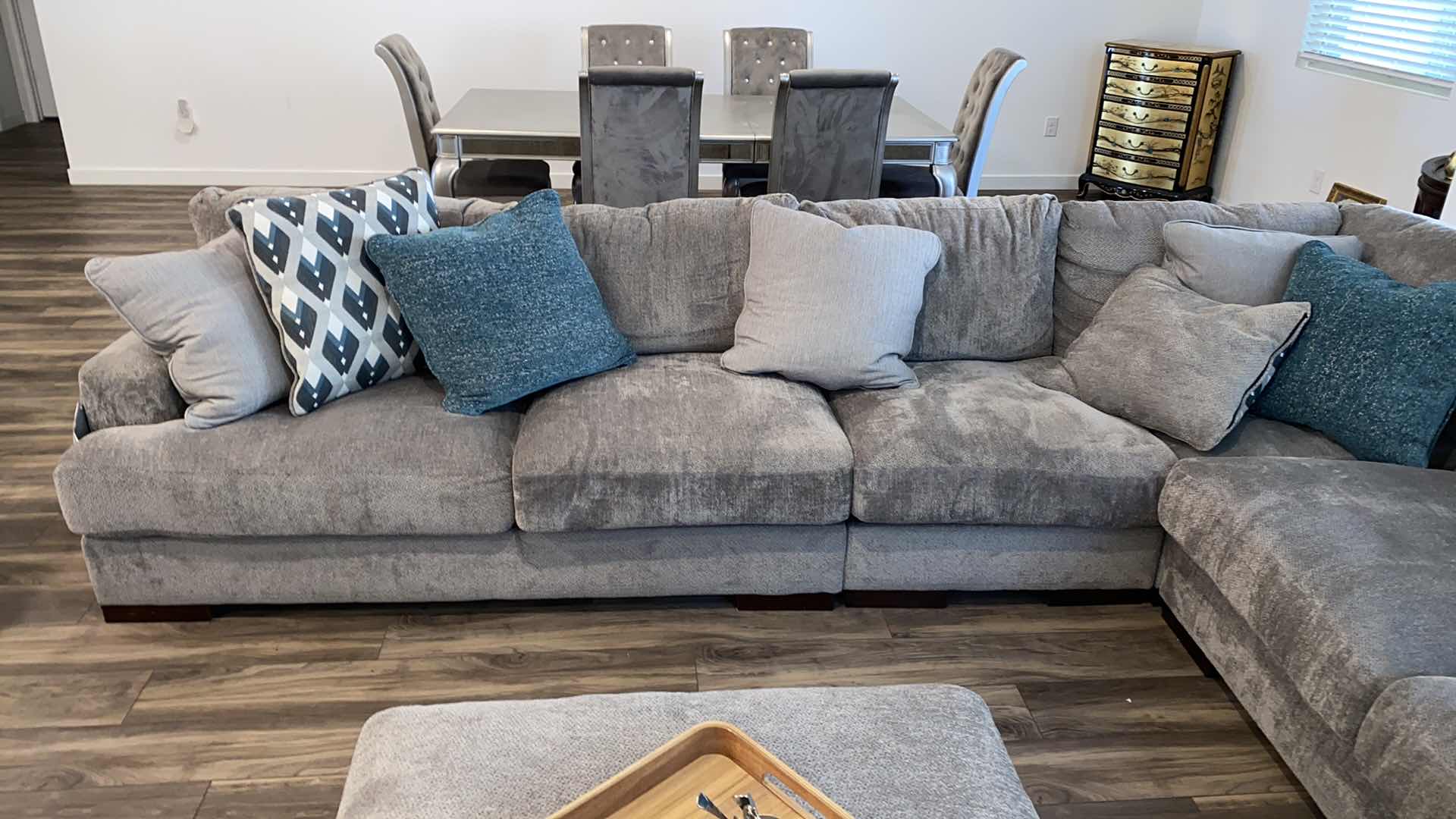 Photo 1 of 11’ 7” X 14” 3” ( CHAISE IS 64”) ASHLEY SILVER FABRIQUE SECTIONAL WITH CHAISE AND OTTOMAN
