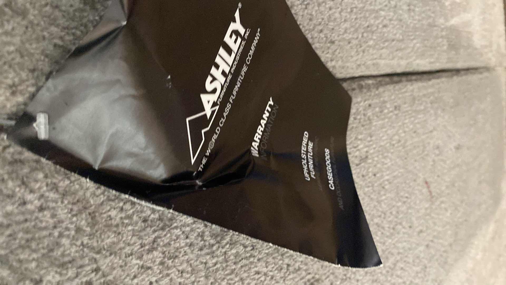 Photo 1 of 11’ 7” X 14” 3” ( CHAISE IS 64”) ASHLEY SILVER FABRIQUE SECTIONAL WITH CHAISE AND OTTOMAN