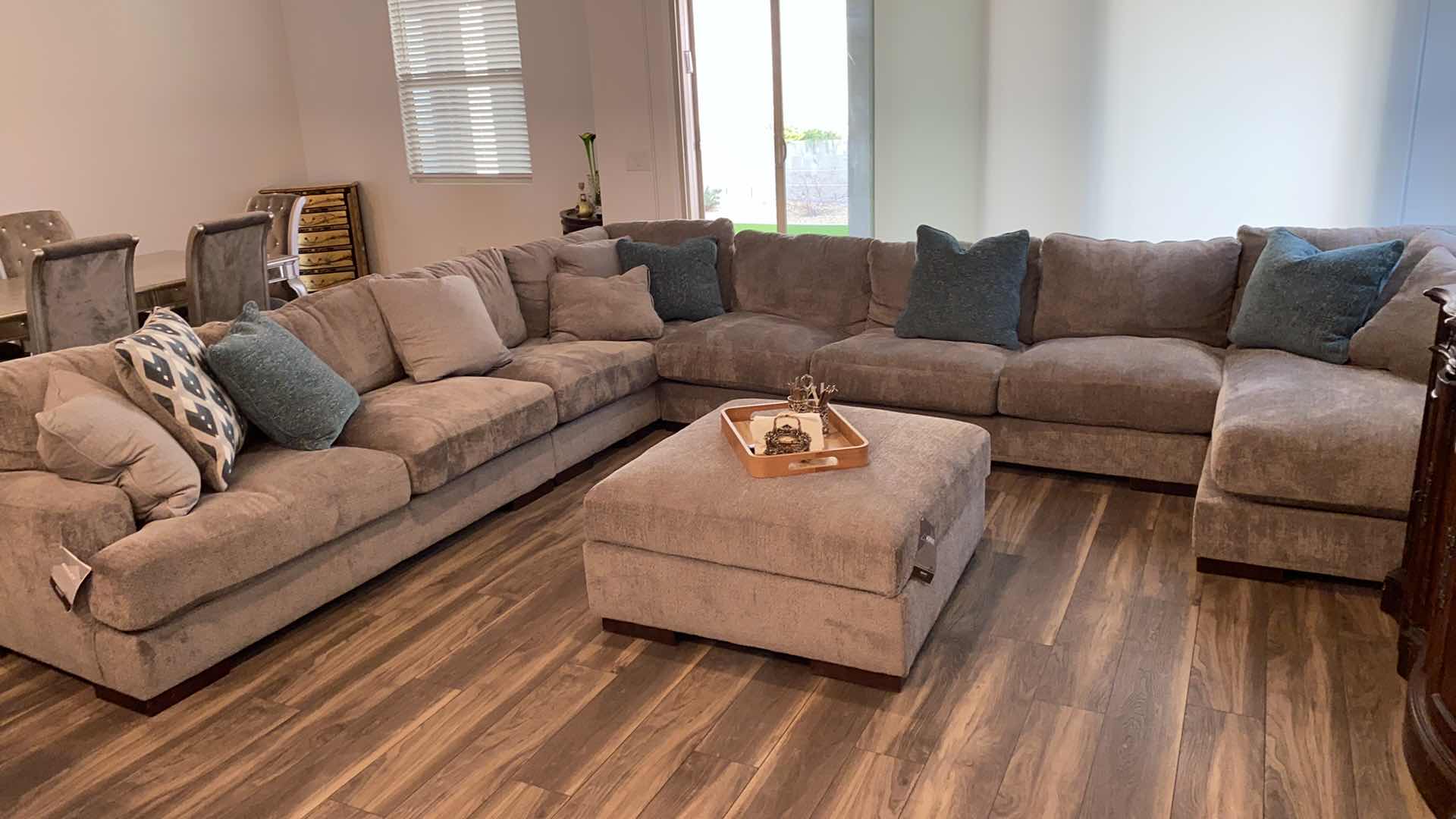 Photo 1 of 11’ 7” X 14” 3” ( CHAISE IS 64”) ASHLEY SILVER FABRIQUE SECTIONAL WITH CHAISE AND OTTOMAN