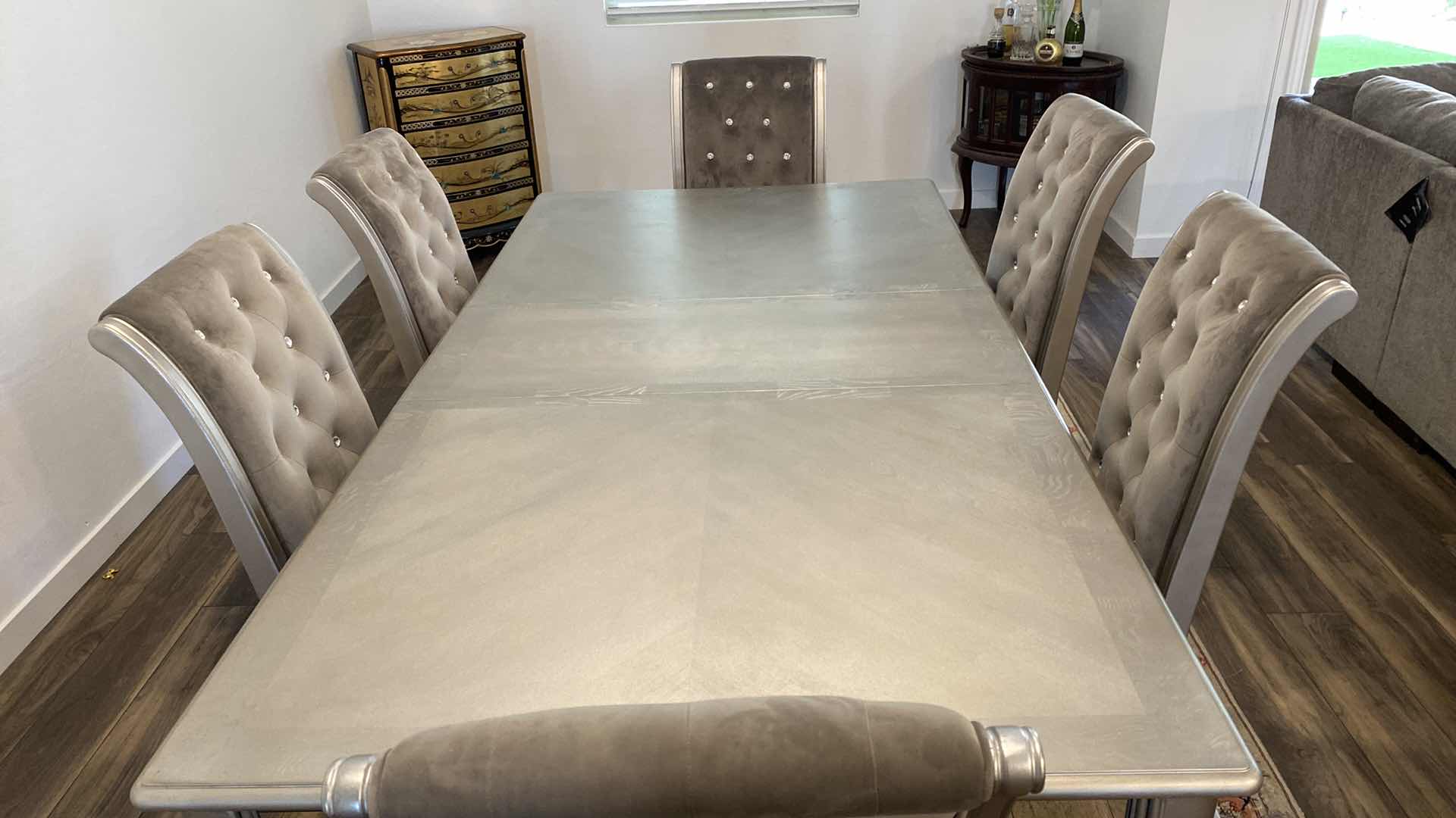 Photo 1 of ASHLEY FURNITURE HOLLYWOOD GLAMOUR WOOD TABLE SILVER FINISH, ANTIQUE GLASS ON SIDE EDGE 70” x 45” without leaf, LEAF 18” ( CHAIRS SOLD SEPARATELY 6 AVAILABLE)