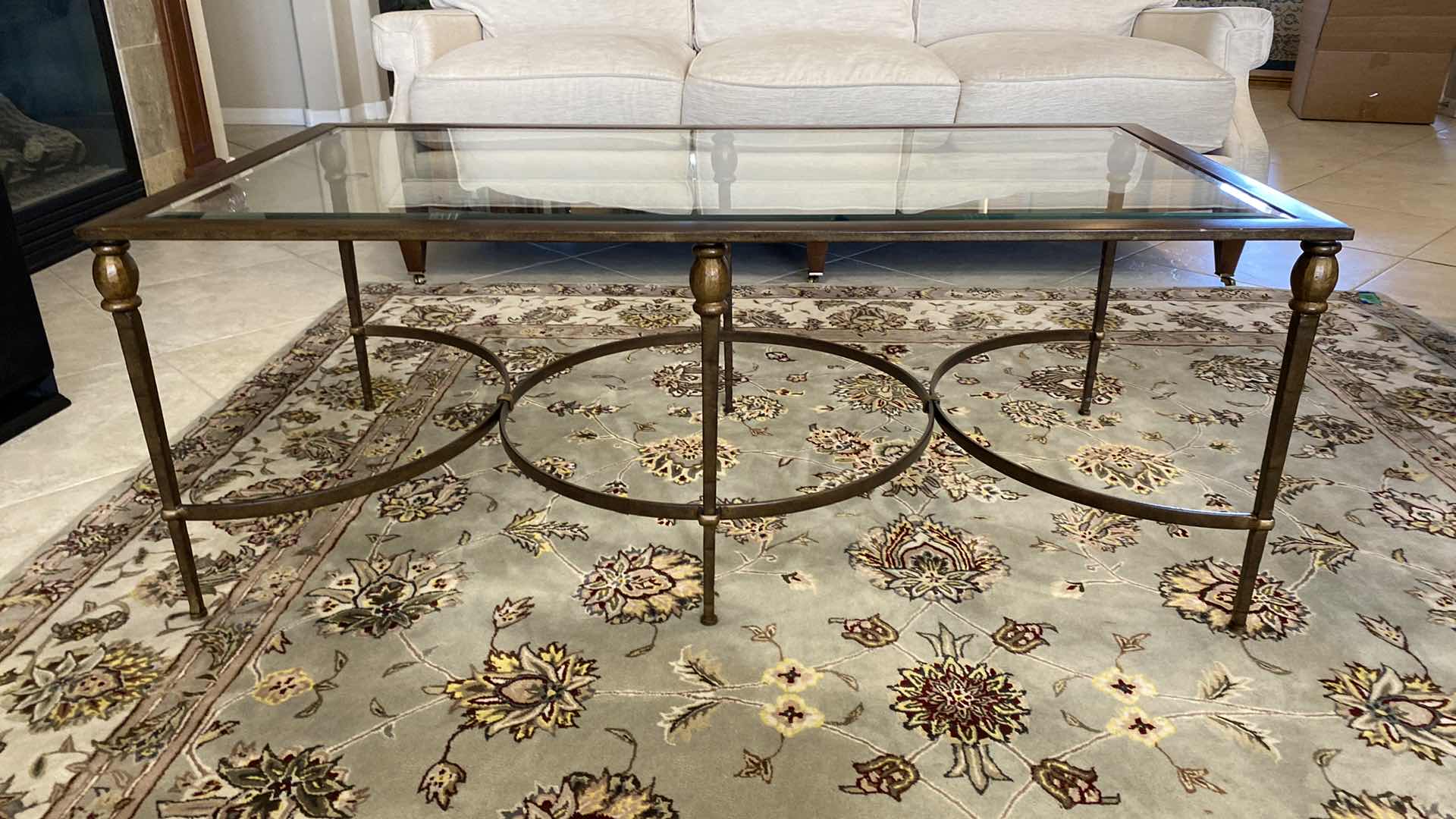 Photo 1 of BEVELED GLASS AND IRON COCKTAIL TABLE 50” x 26”