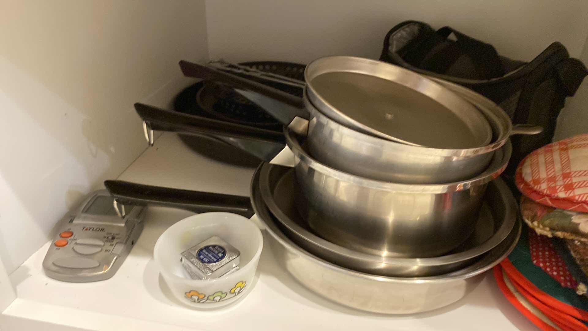 Photo 1 of CONTENTS OF CABINET BUTLERS PANTRY POTS PANS, PLASTIC SERVEWARE AND MORE