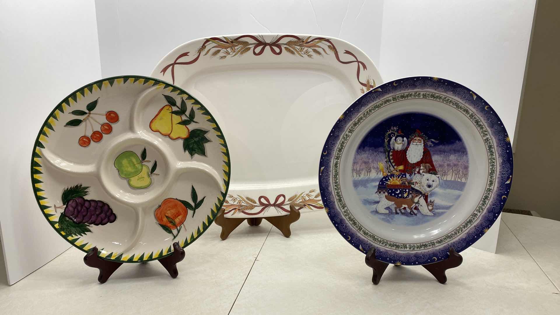 Photo 2 of 2 CERAMIC ROUND PLATTERS AND PLASTIC PLATTER BASKET