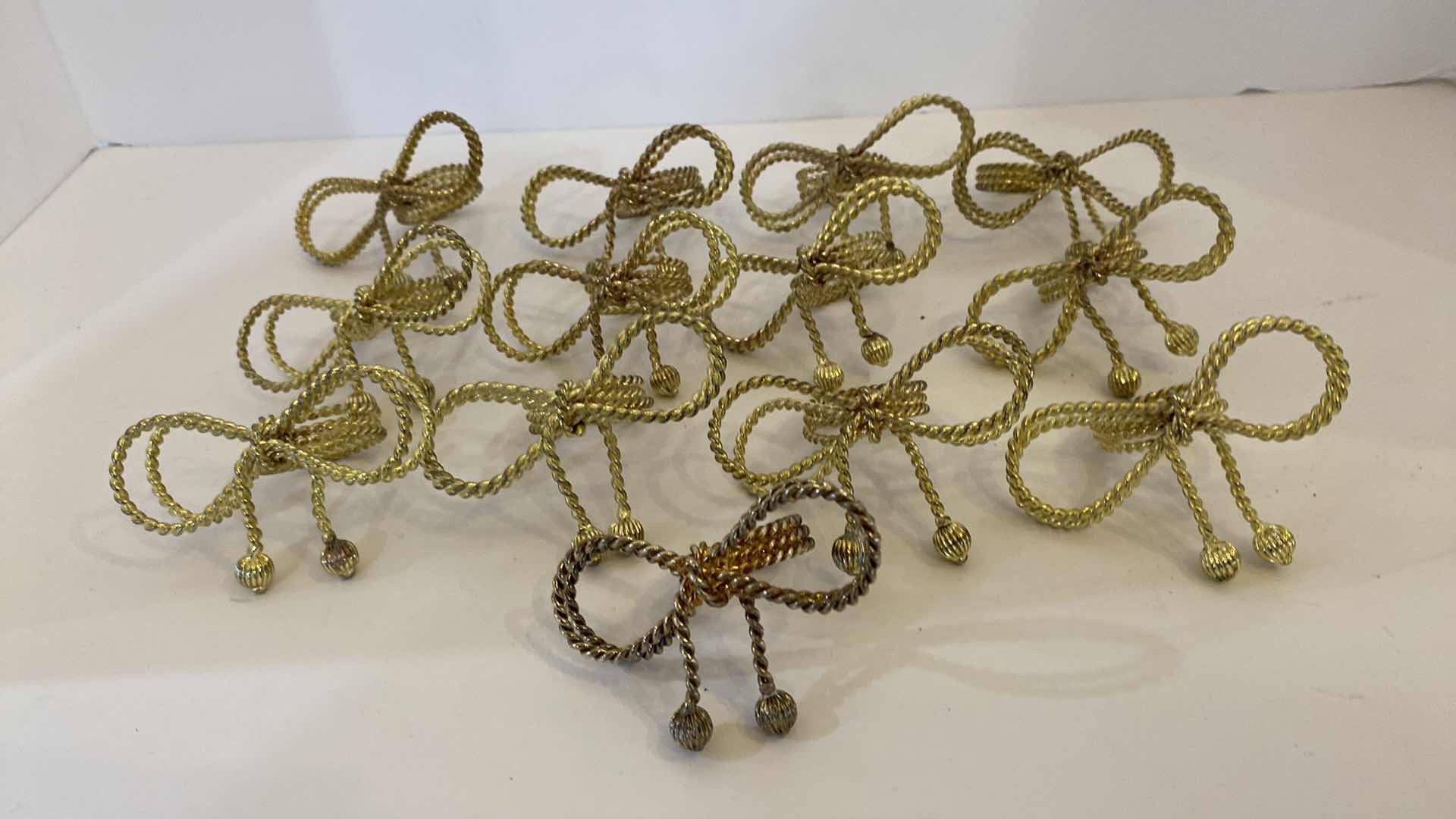 Photo 1 of 13 GOLD BRAIDED BOWS NAPKIN RINGS