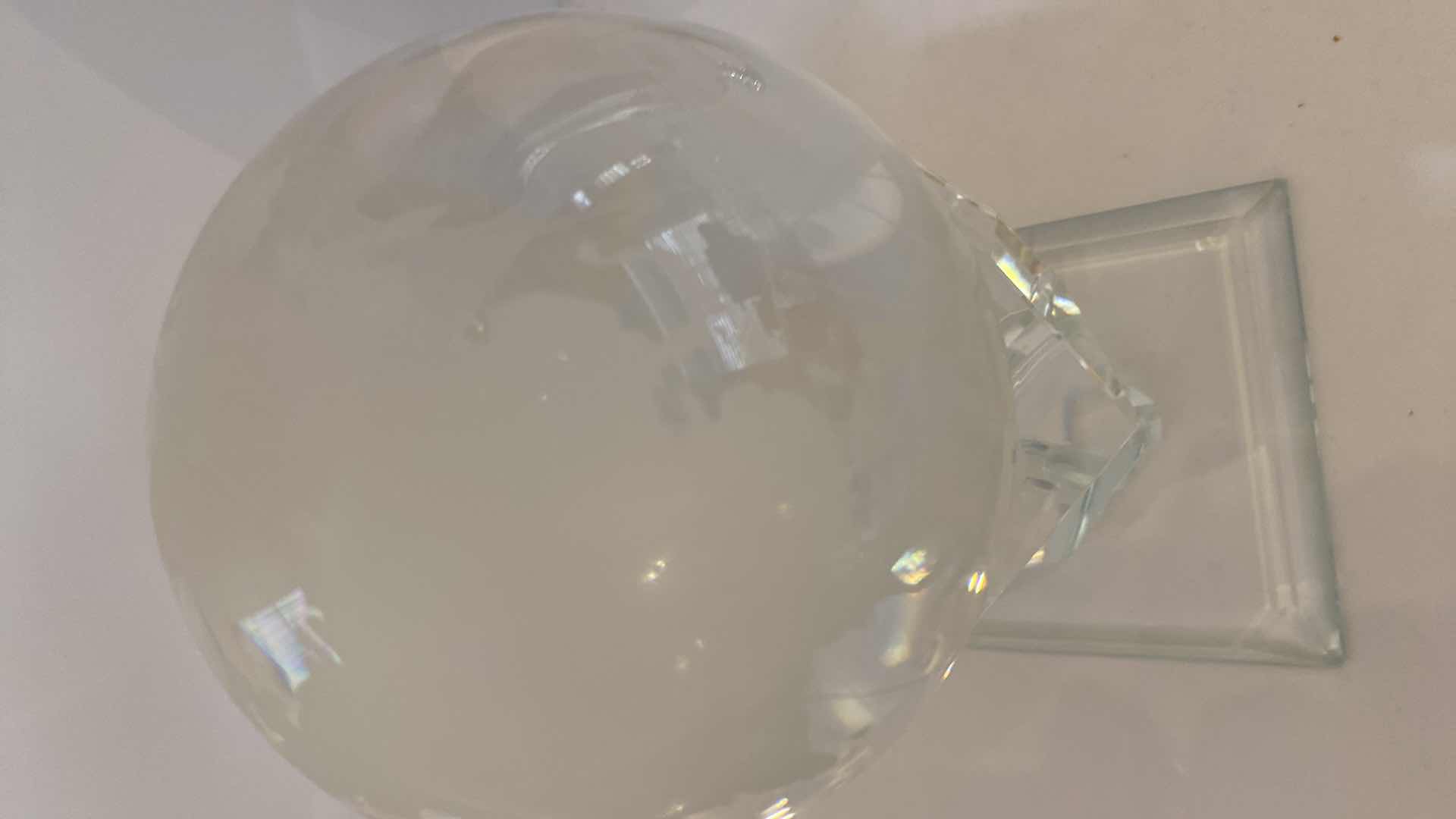 Photo 1 of CRYSTAL GLOBE IN HAND 4” ON CRYSTAL STAND OVERALL HEIGHT 7”