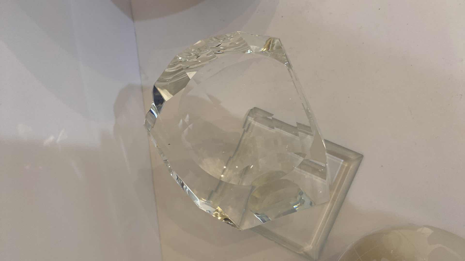 Photo 1 of CRYSTAL GLOBE IN HAND 4” ON CRYSTAL STAND OVERALL HEIGHT 7”