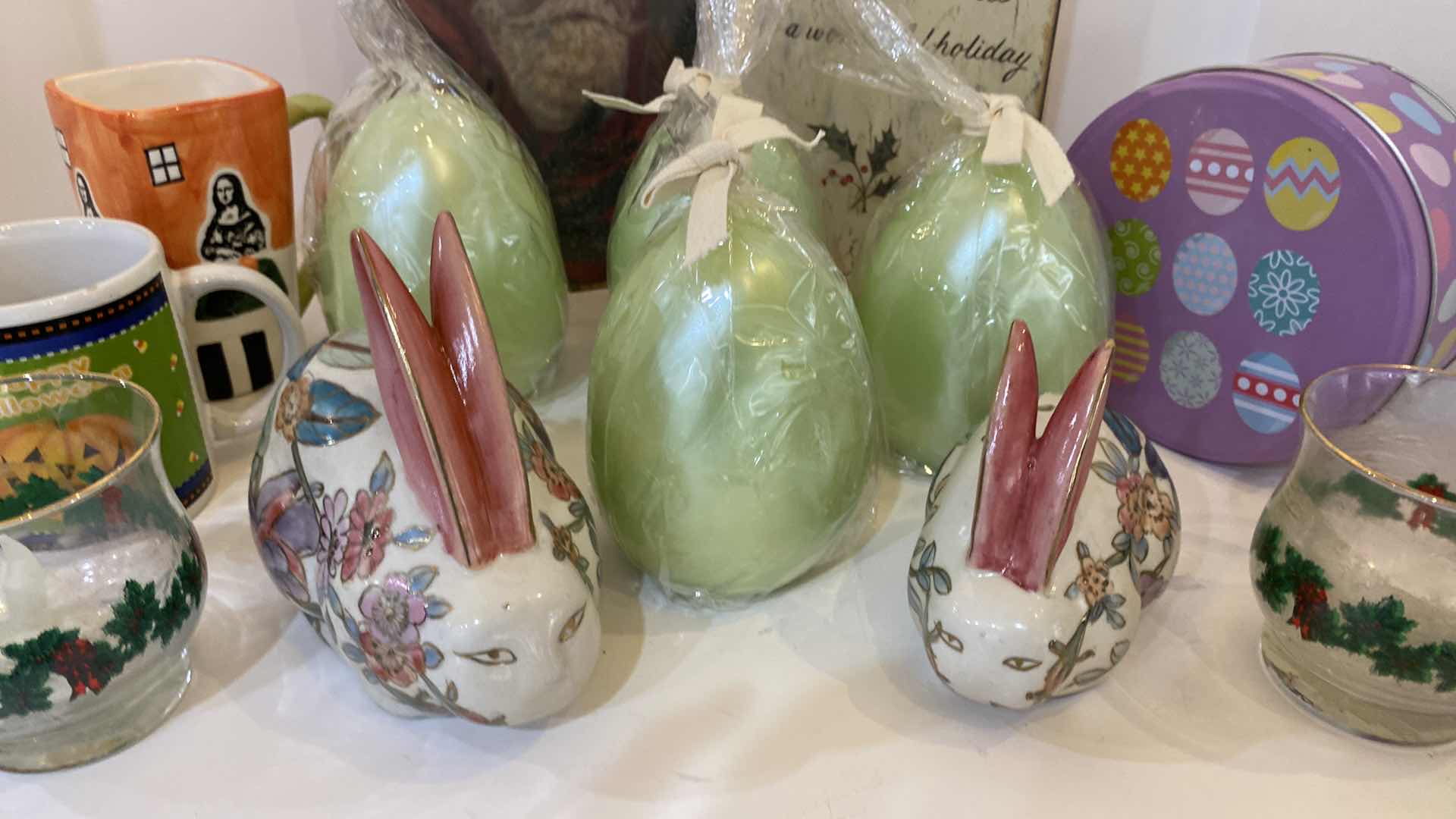 Photo 1 of ASSORTED HOLIDAY DECOR - EGG CANDLES FROM POTTERY BARN