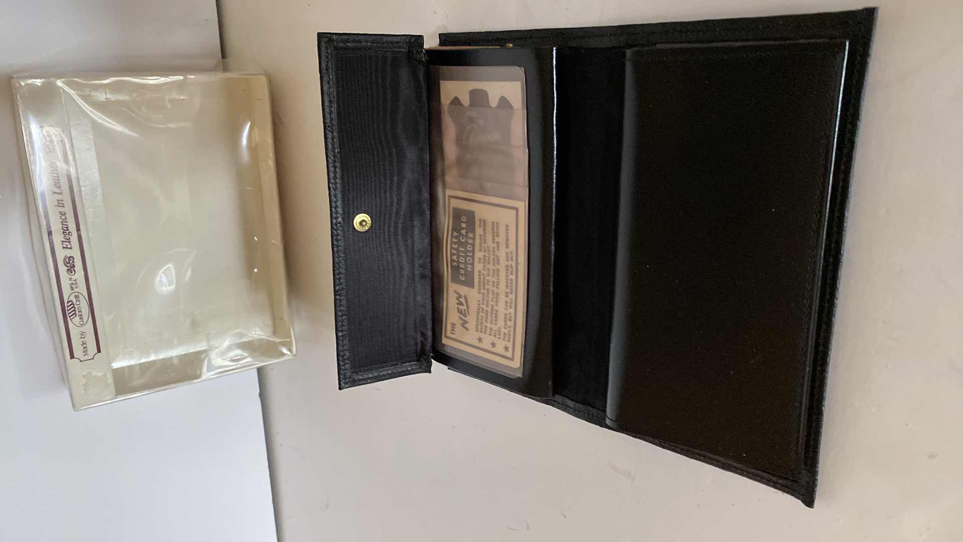Photo 1 of CUSTOM CRAFT LEATHER CHECKBOOK WALLET IN BOX 7” x 4”