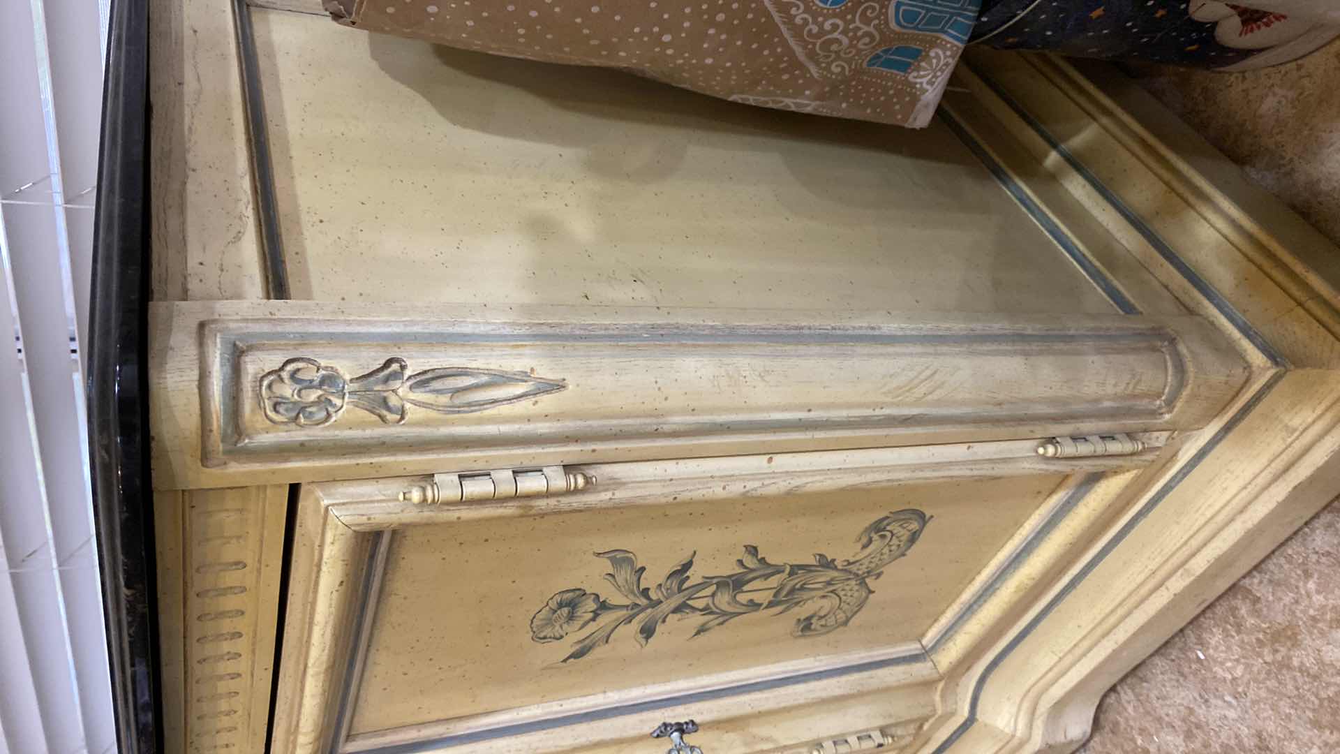 Photo 1 of SIDEBOARD WITH BLACK STONE TOP AND FLIRAL DESIGN 43“ x 19“ H 29”