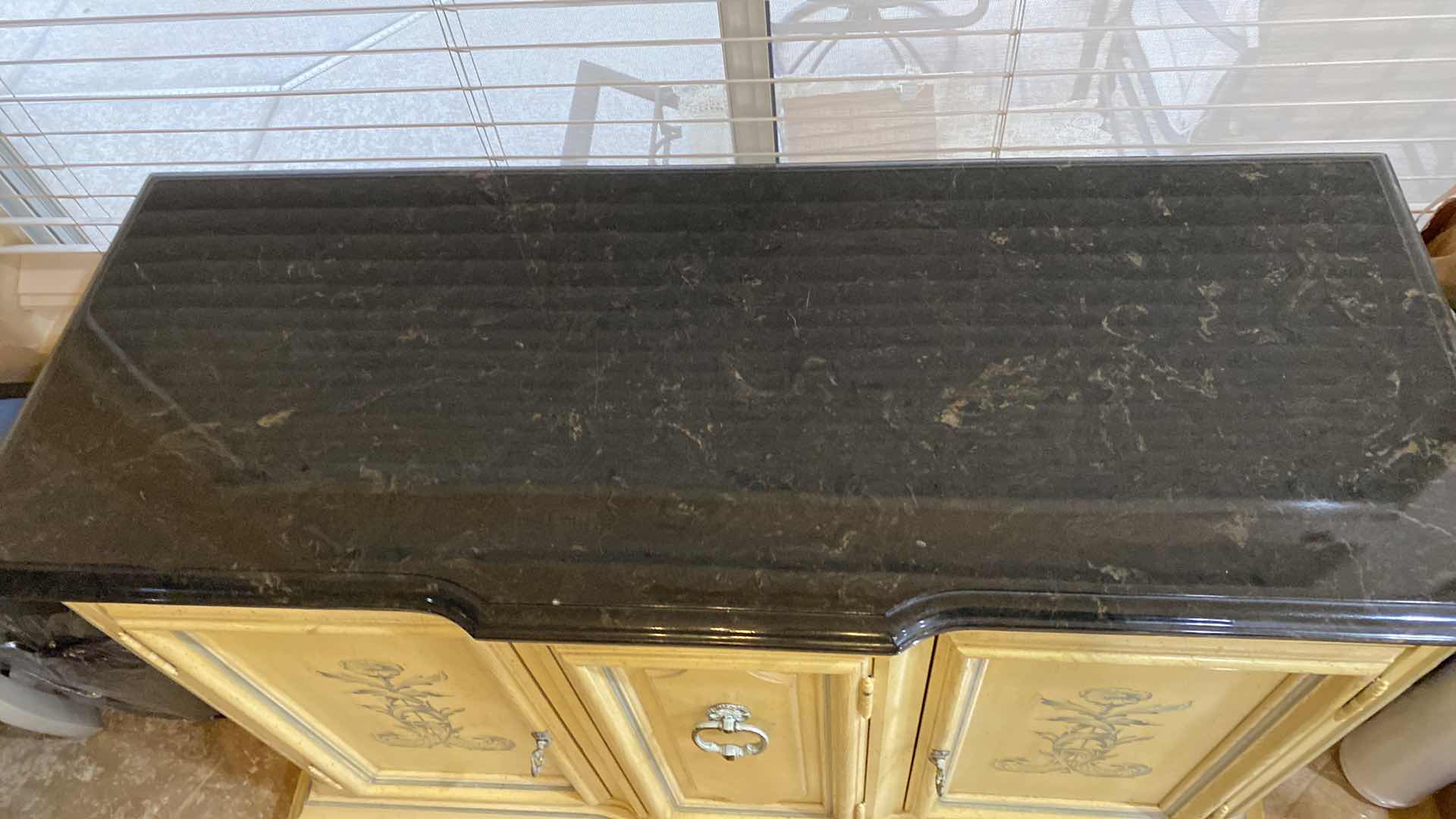 Photo 1 of SIDEBOARD WITH BLACK STONE TOP AND FLIRAL DESIGN 43“ x 19“ H 29”