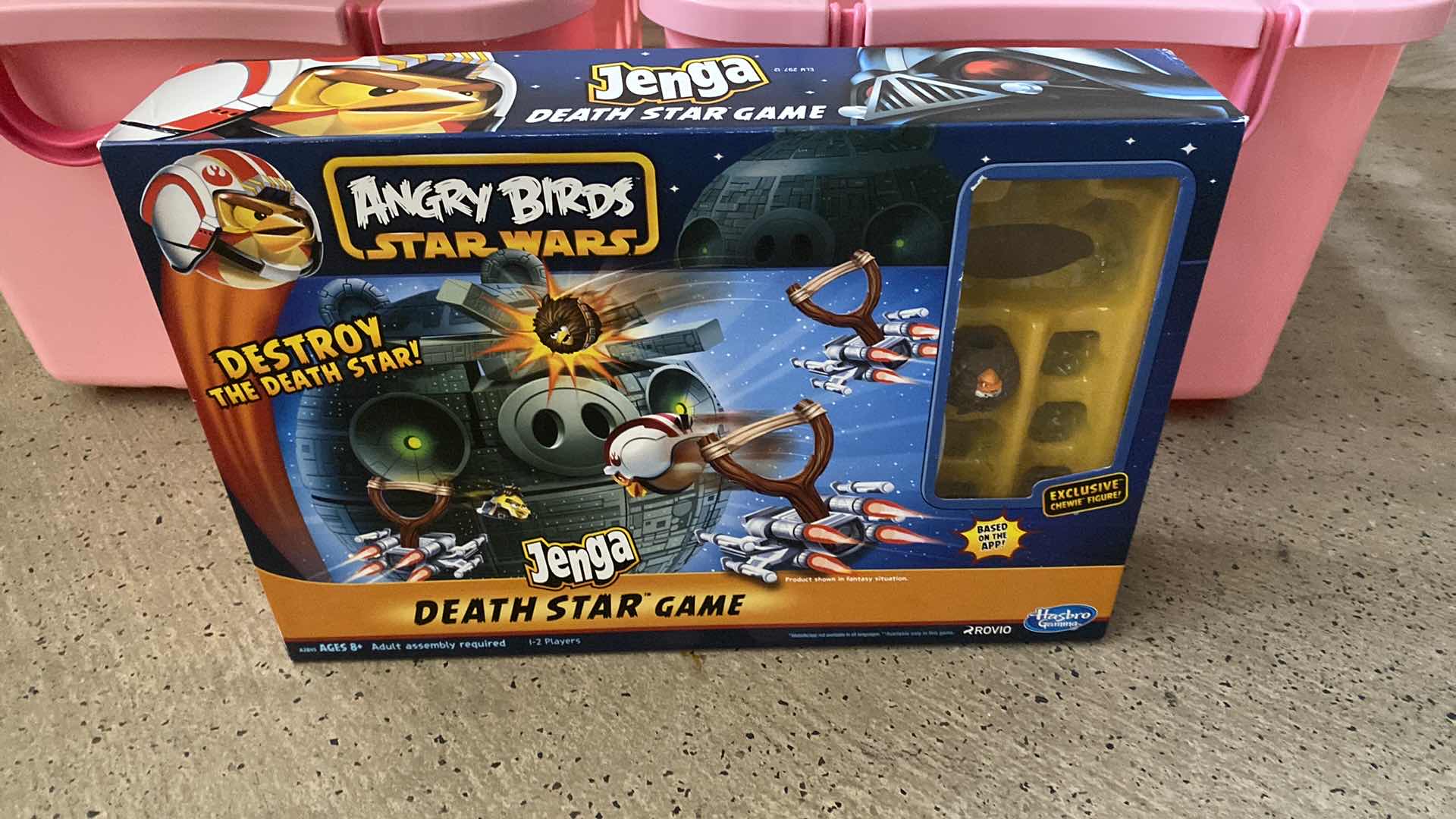 Photo 1 of PAIR OF PLASTIC PINK TOTES WITH WHEELS 20” x 16” H 10 1/2” AND ANGRY BIRDS GAME - UNKNOWN IF PIECES MISSING