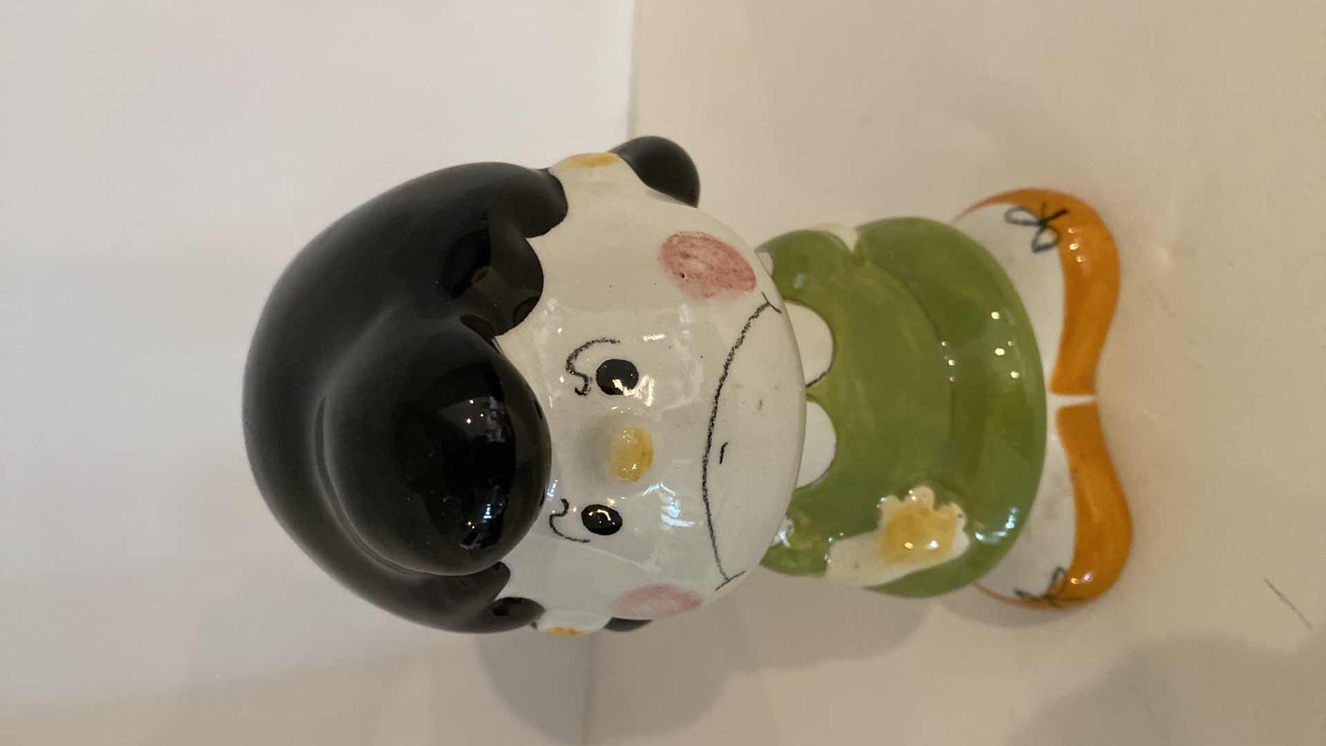 Photo 1 of LUCY CERAMIC COIN BANK 7”