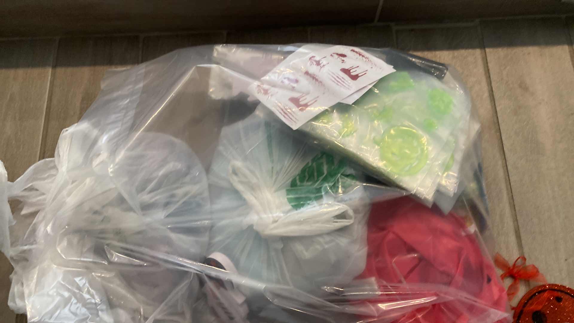 Photo 1 of BAG OF PARTY SUPPLIES