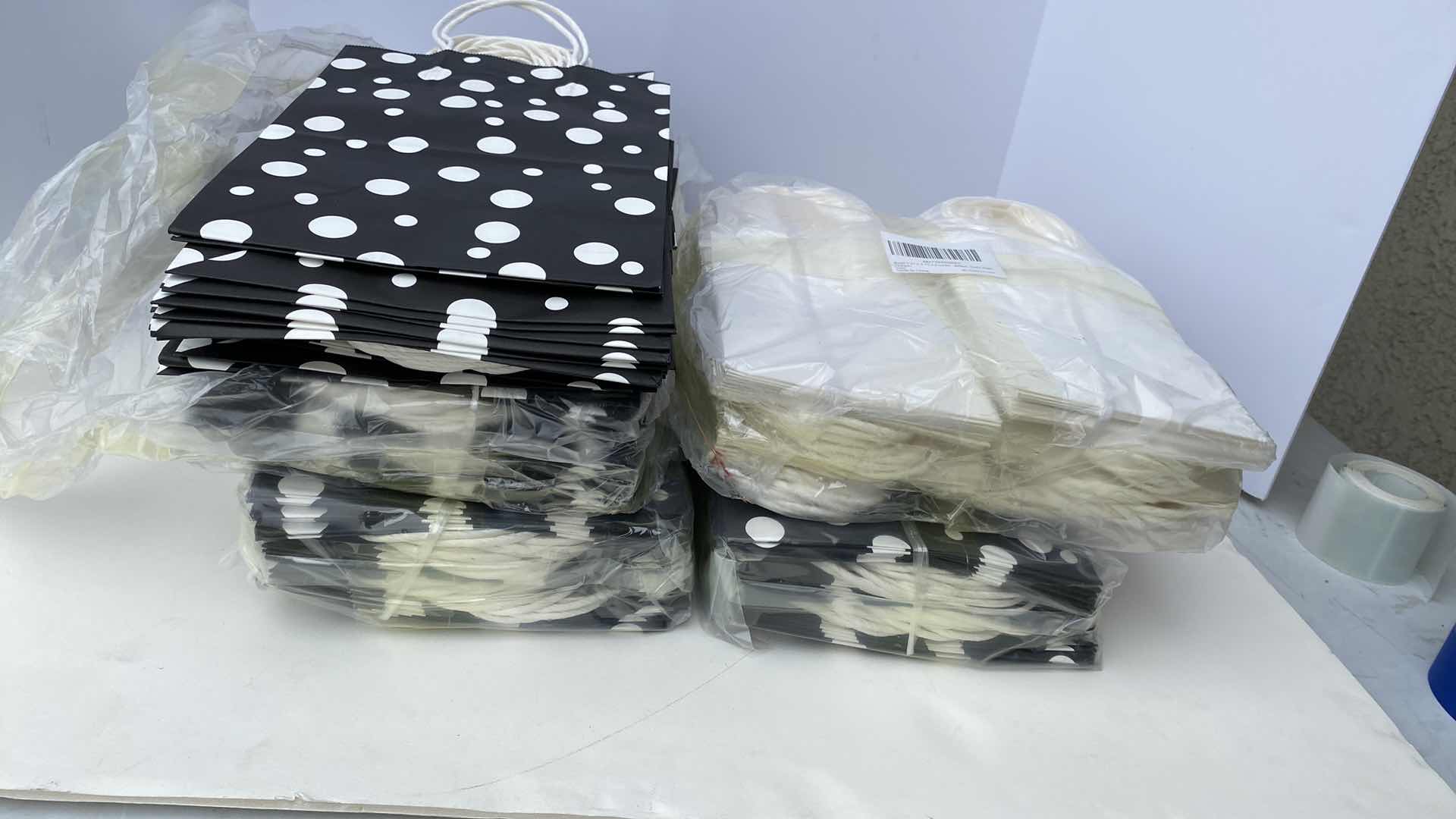 Photo 1 of GIFT BAGS POLKA DOT 8” x 10”, WHITE 5 1/4” x 8”