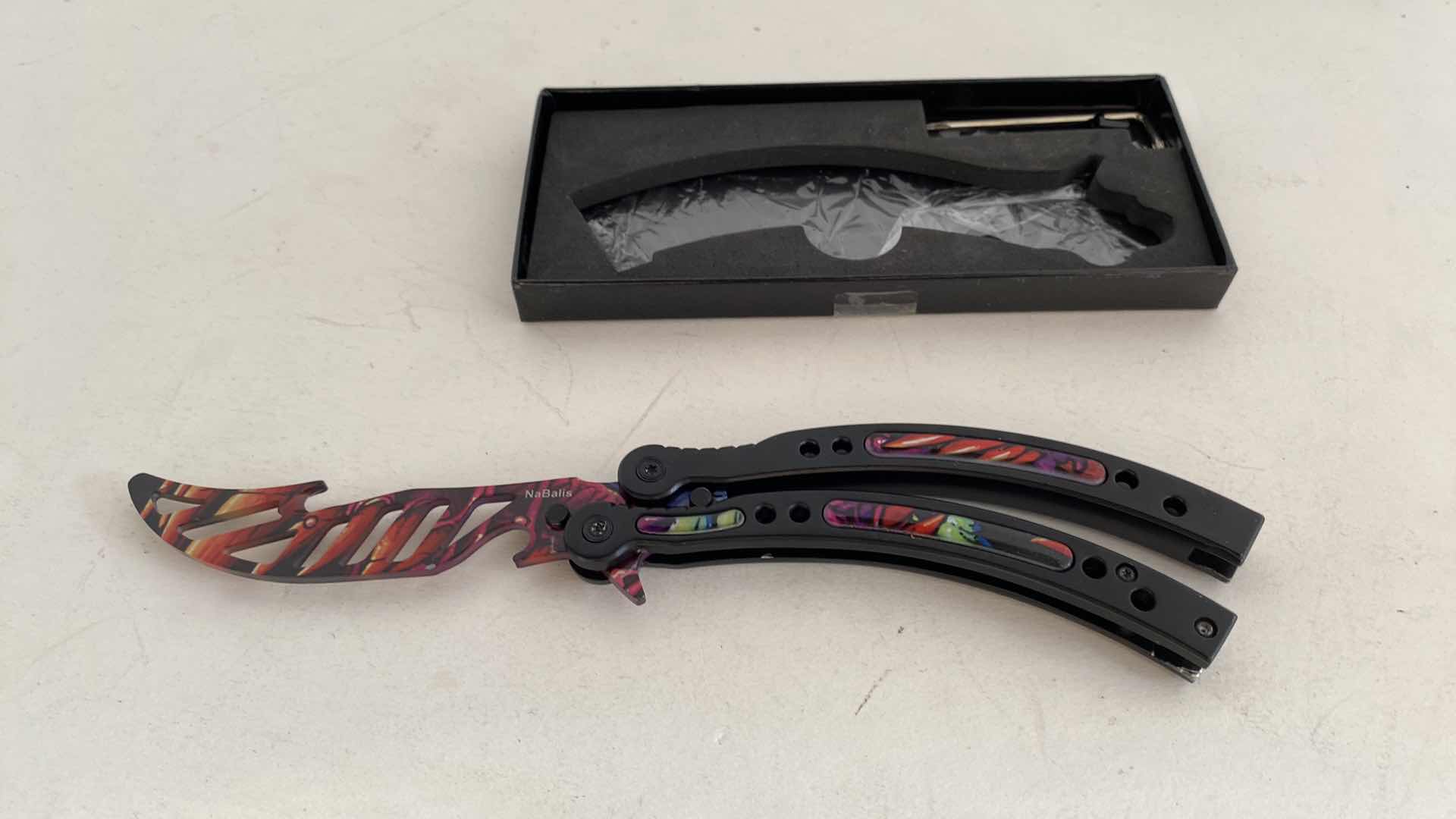 Photo 1 of NABALIS RHINOFLY BOTTLE OPENER