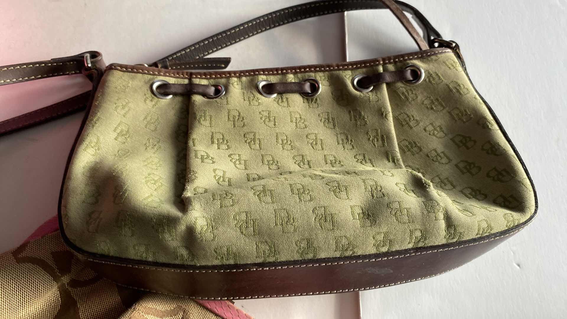 Photo 1 of DOONEY & BOURKE, COACH AND MORE CLUTCHES AND WALLETS