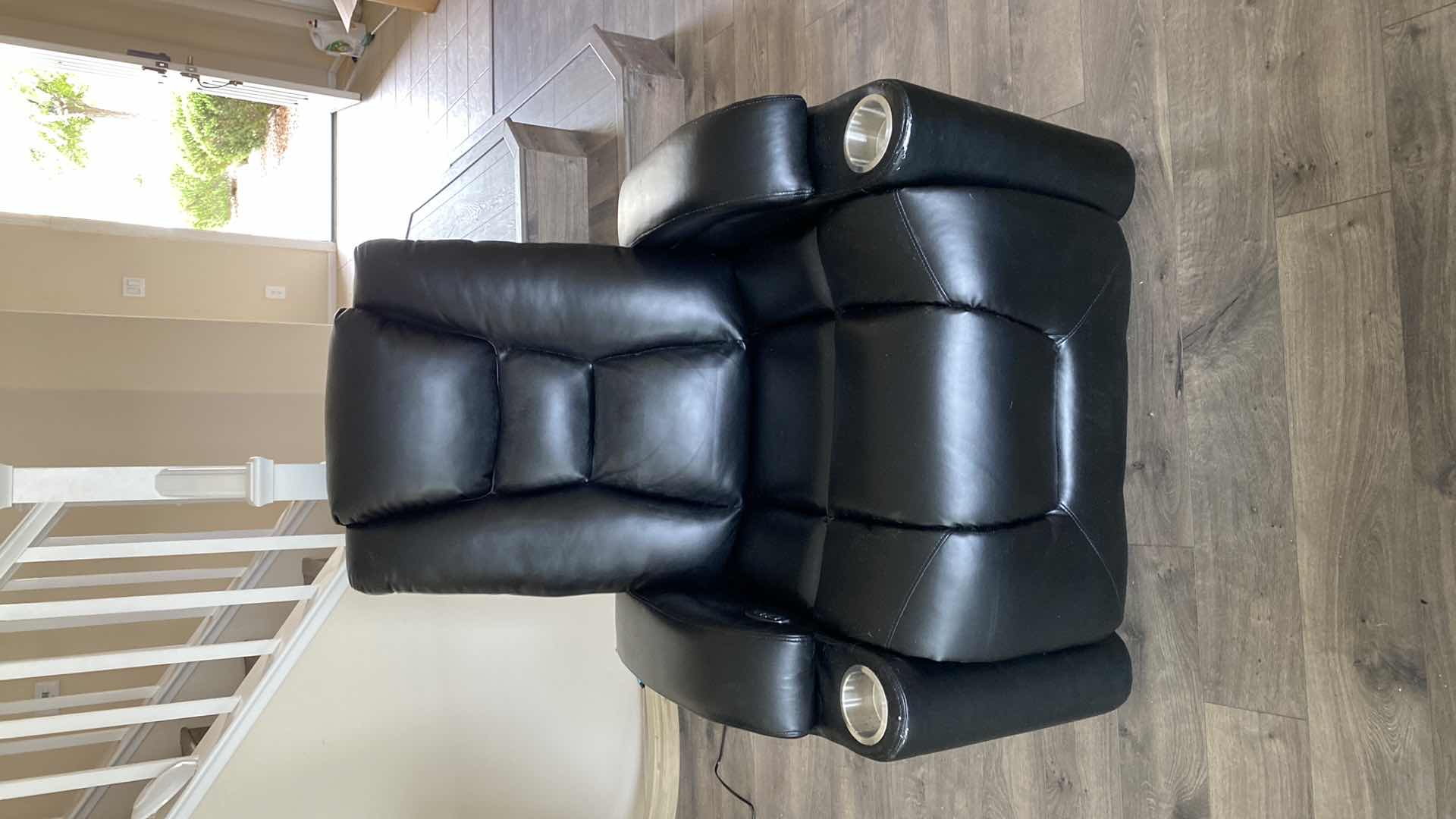 Photo 1 of BLACK BONDED LEATHER POWER RECLINE CHAIR WITH HEAD HEIGHT ADJUSTMENT AND FOOT STOOL