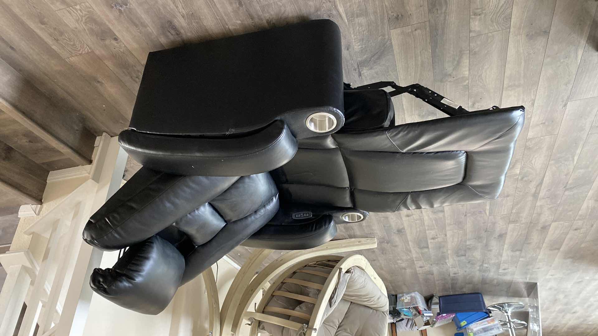 Photo 1 of BLACK BONDED LEATHER POWER RECLINE CHAIR WITH HEAD HEIGHT ADJUSTMENT AND FOOT STOOL