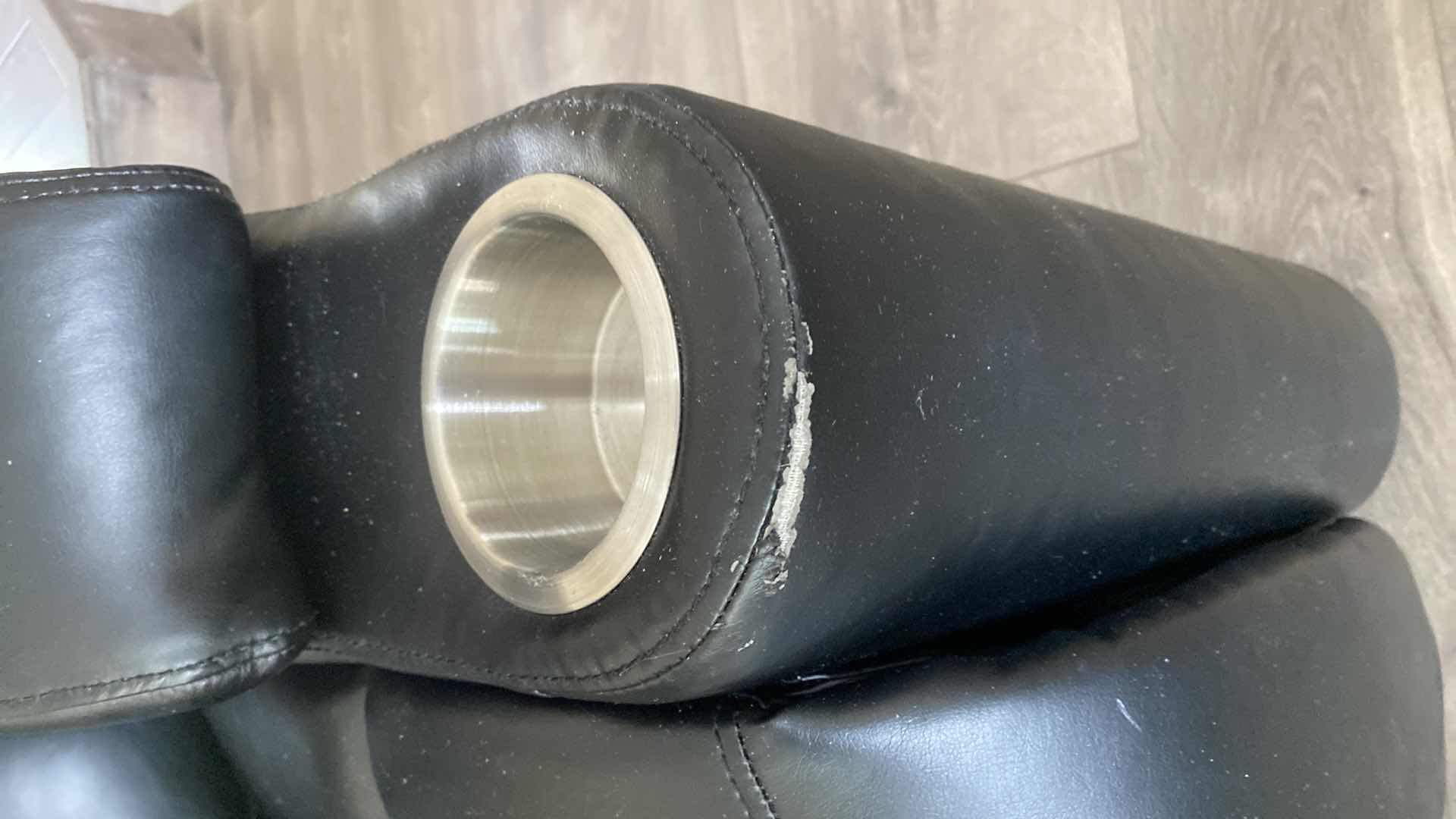 Photo 1 of BLACK BONDED LEATHER POWER RECLINE CHAIR WITH HEAD HEIGHT ADJUSTMENT AND FOOT STOOL