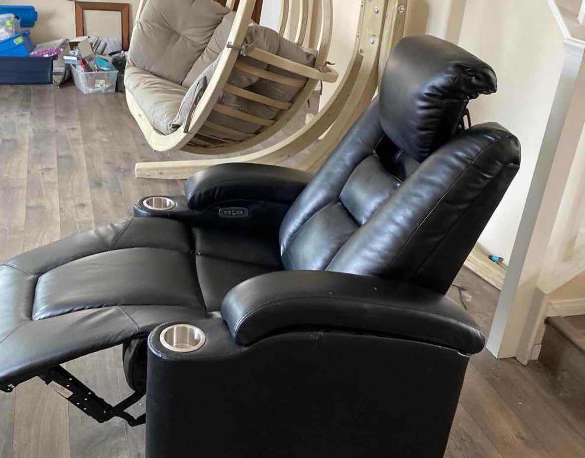 Photo 1 of BLACK BONDED LEATHER POWER RECLINE CHAIR WITH HEAD HEIGHT ADJUSTMENT AND FOOT STOOL
