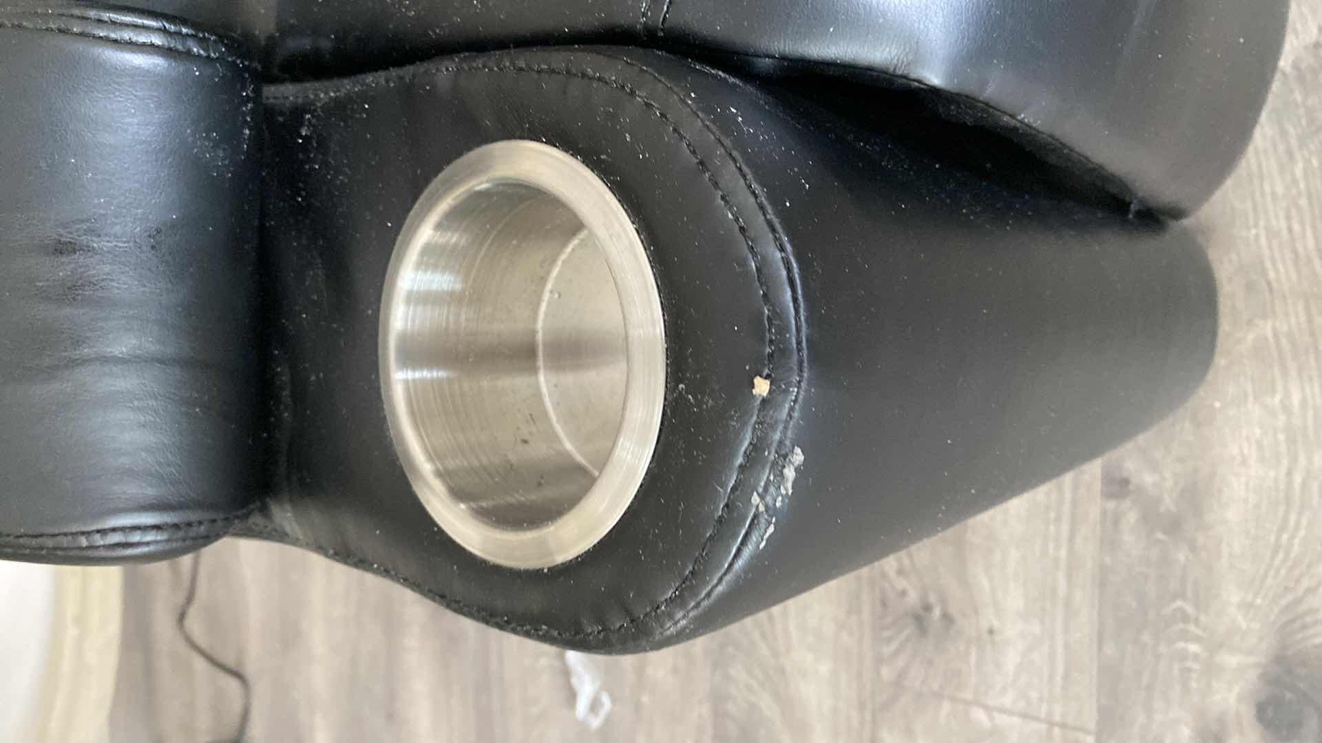 Photo 1 of BLACK BONDED LEATHER POWER RECLINE CHAIR WITH HEAD HEIGHT ADJUSTMENT AND FOOT STOOL