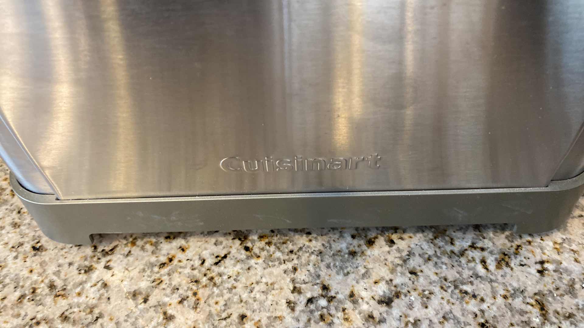 Photo 1 of CONTENTS OF CABINET BBQ TOOLS AND CUISINART 4 SLICE TOASTER