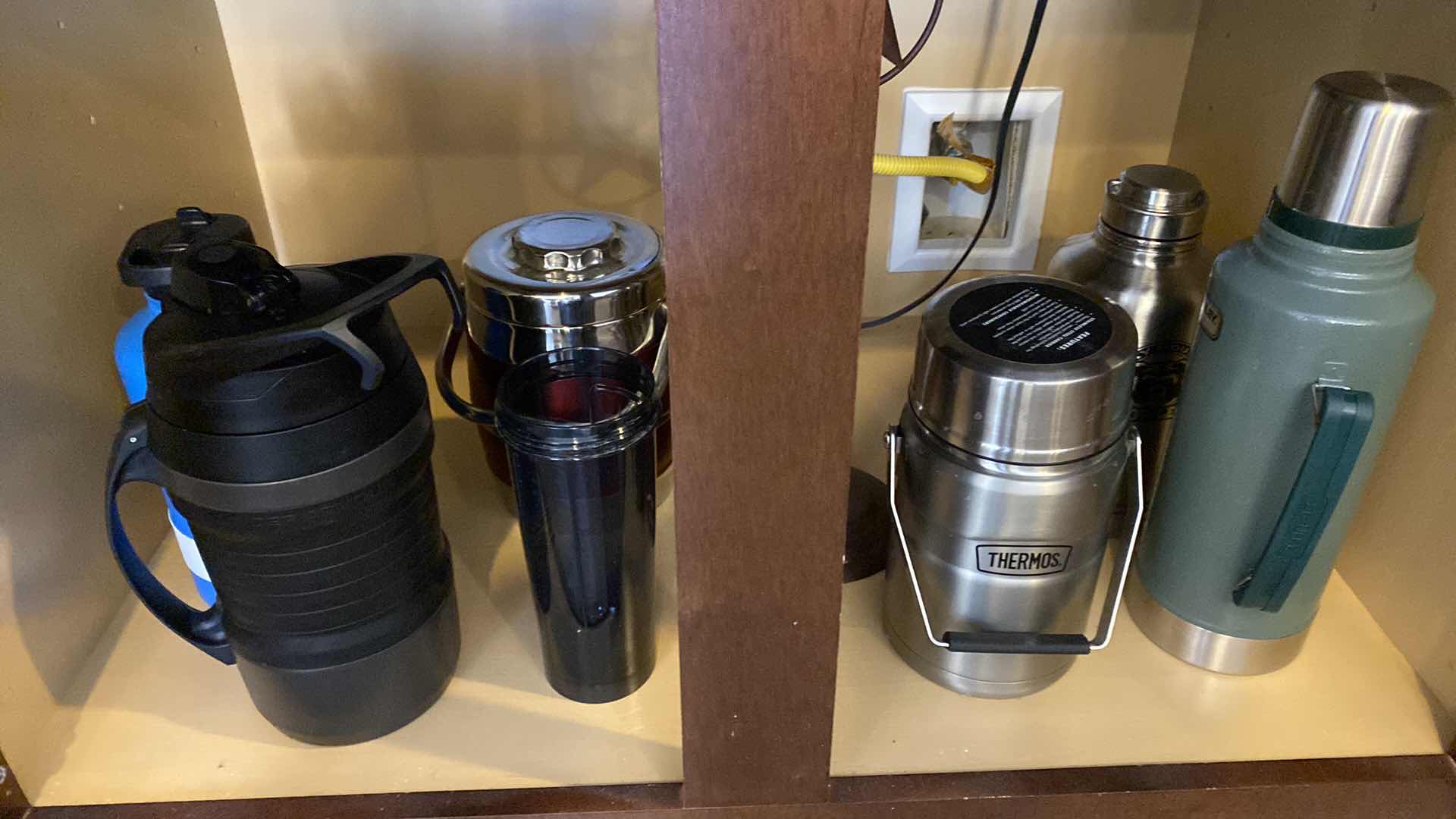 Photo 1 of CONTENTS OF KITCHEN CABINET - THERMOSES