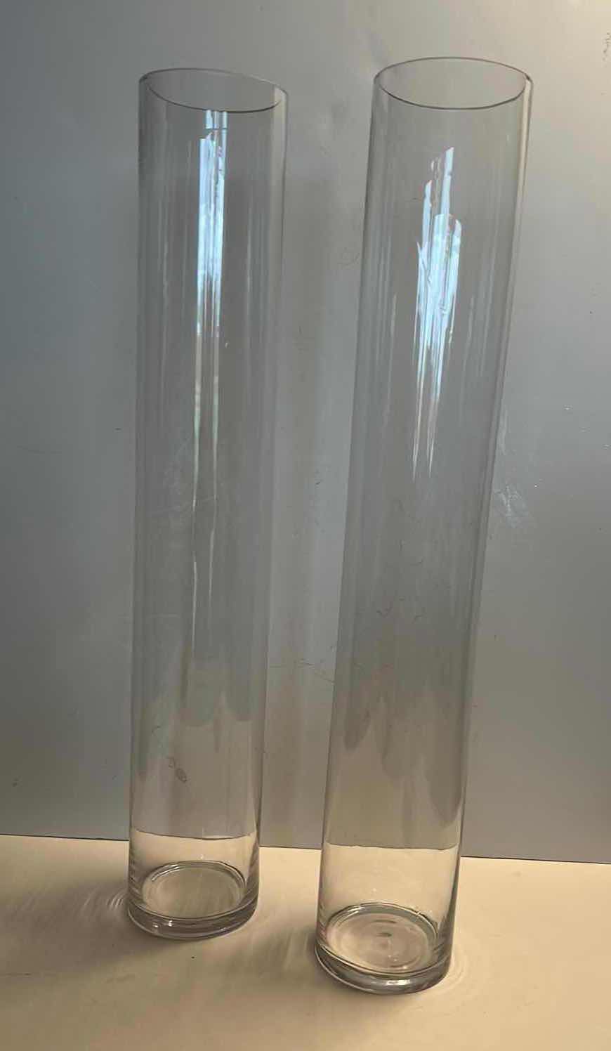 Photo 1 of HOME DECOR- 2 TALL NARROW GLASS VASES 4” x 24”