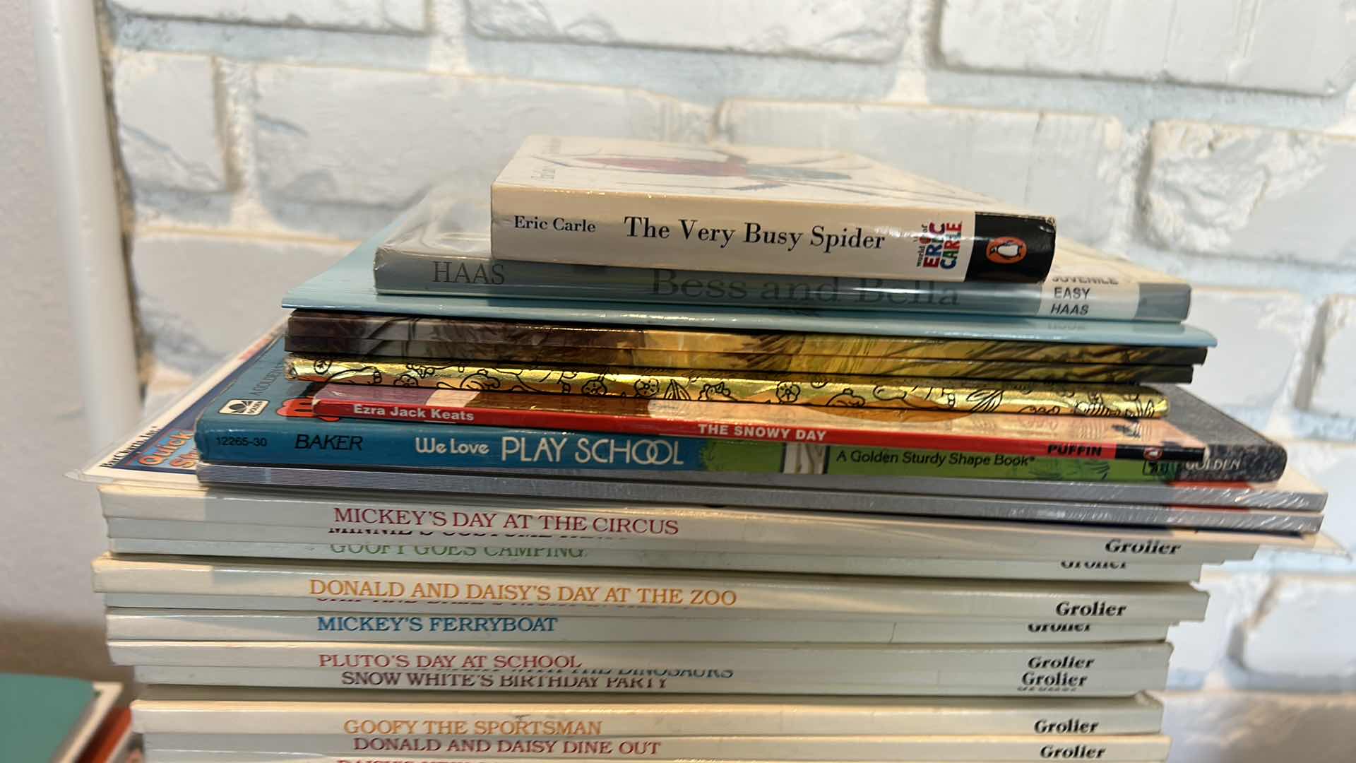 Photo 1 of CHILDRENS BOOK ASSORTMENT (MOSTLY DISNEY) AND STUFFED ANIMAL- 