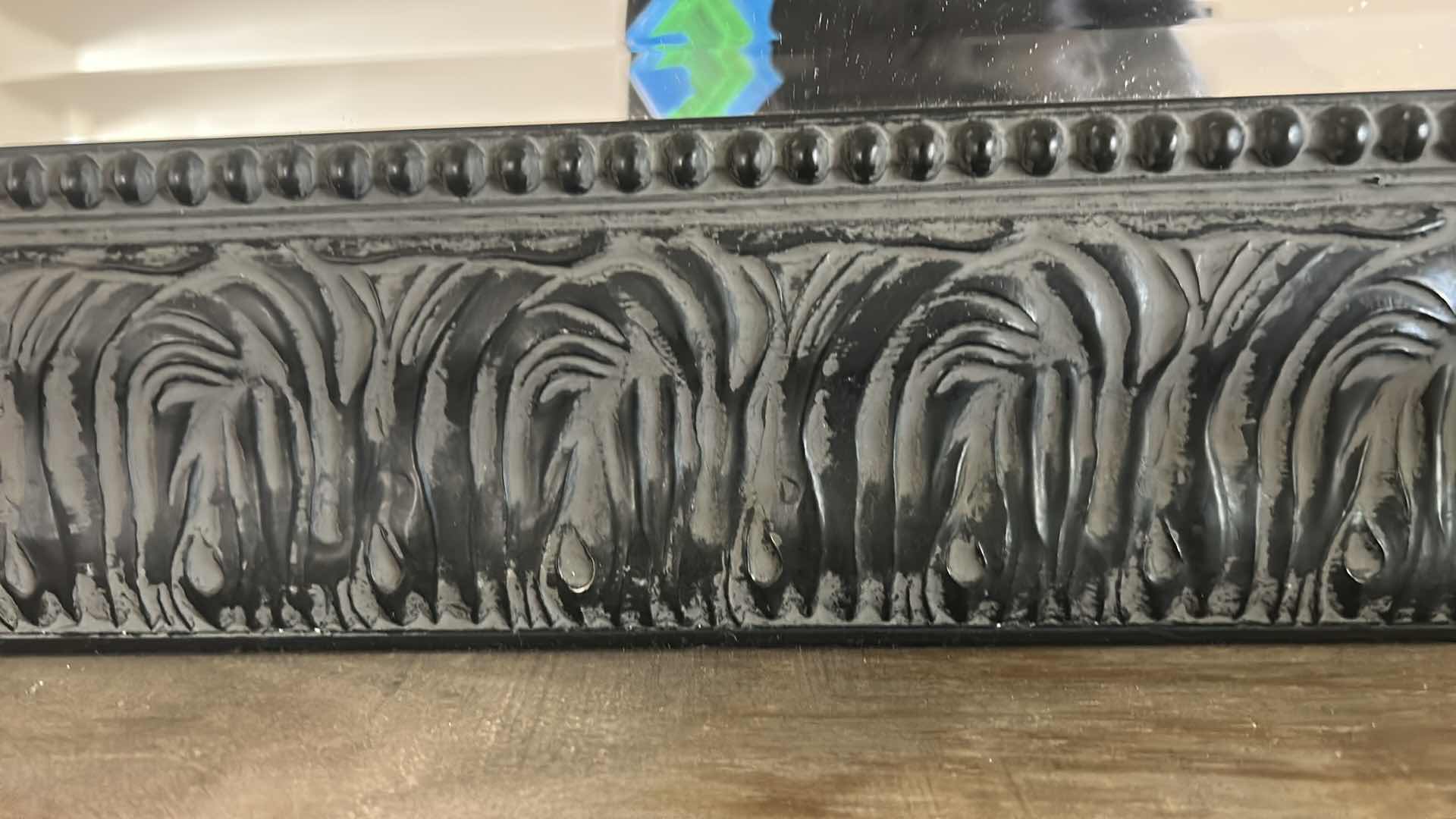 Photo 1 of BLACK FRAMED BEVELED GLASS MIRROR 
29 1/4” x 35 1/4”