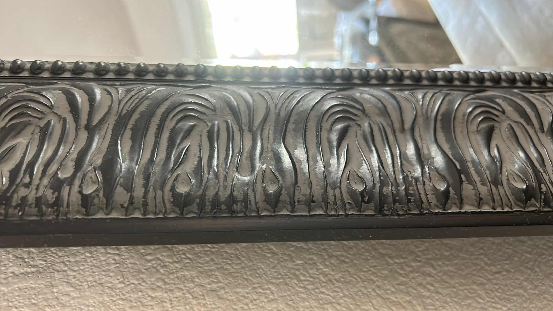 Photo 1 of BLACK FRAMED BEVELED GLASS MIRROR 
29 1/4” x 35 1/4”