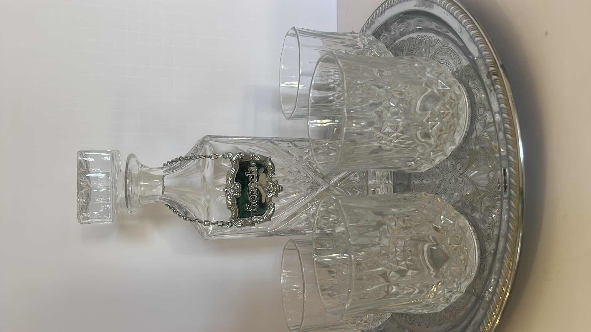 Photo 1 of CRYSTAL DECANTER ABD 4 CRYSTAL GLASSES WITH SILVER TRAY AND SCOTCH LABEL