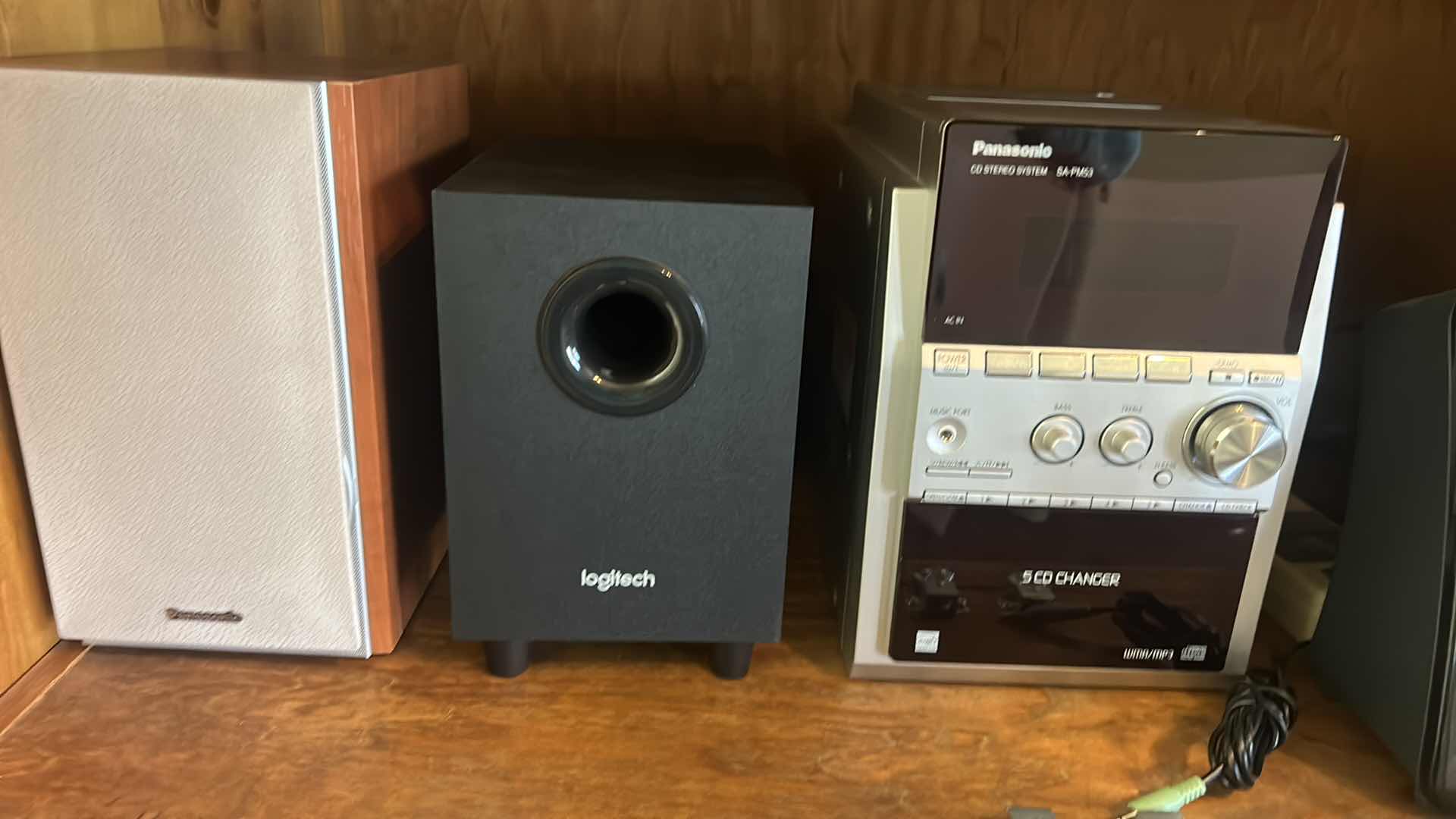 Photo 1 of CONTENTS OF ENTERTAINMENT CABINET: SPEAKERS, WOOFER, CD’s AND MORE