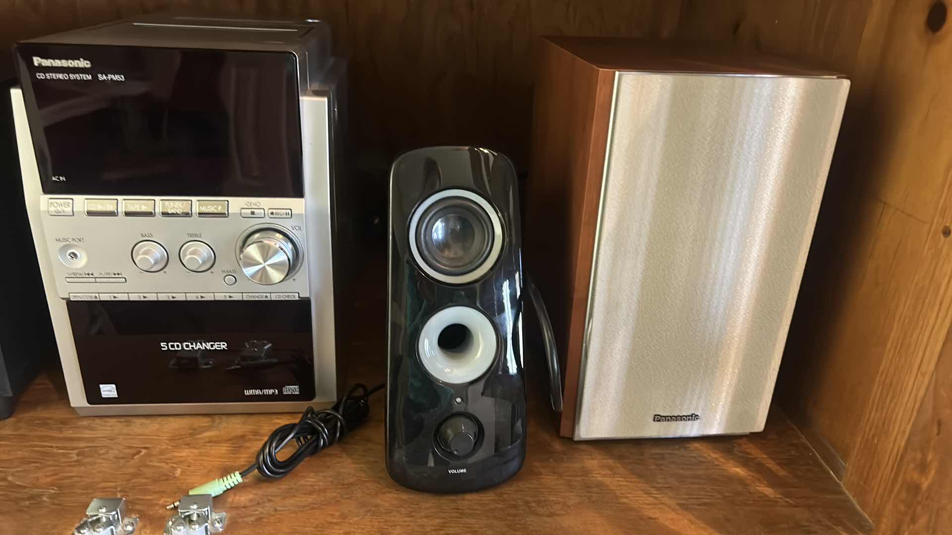 Photo 1 of CONTENTS OF ENTERTAINMENT CABINET: SPEAKERS, WOOFER, CD’s AND MORE