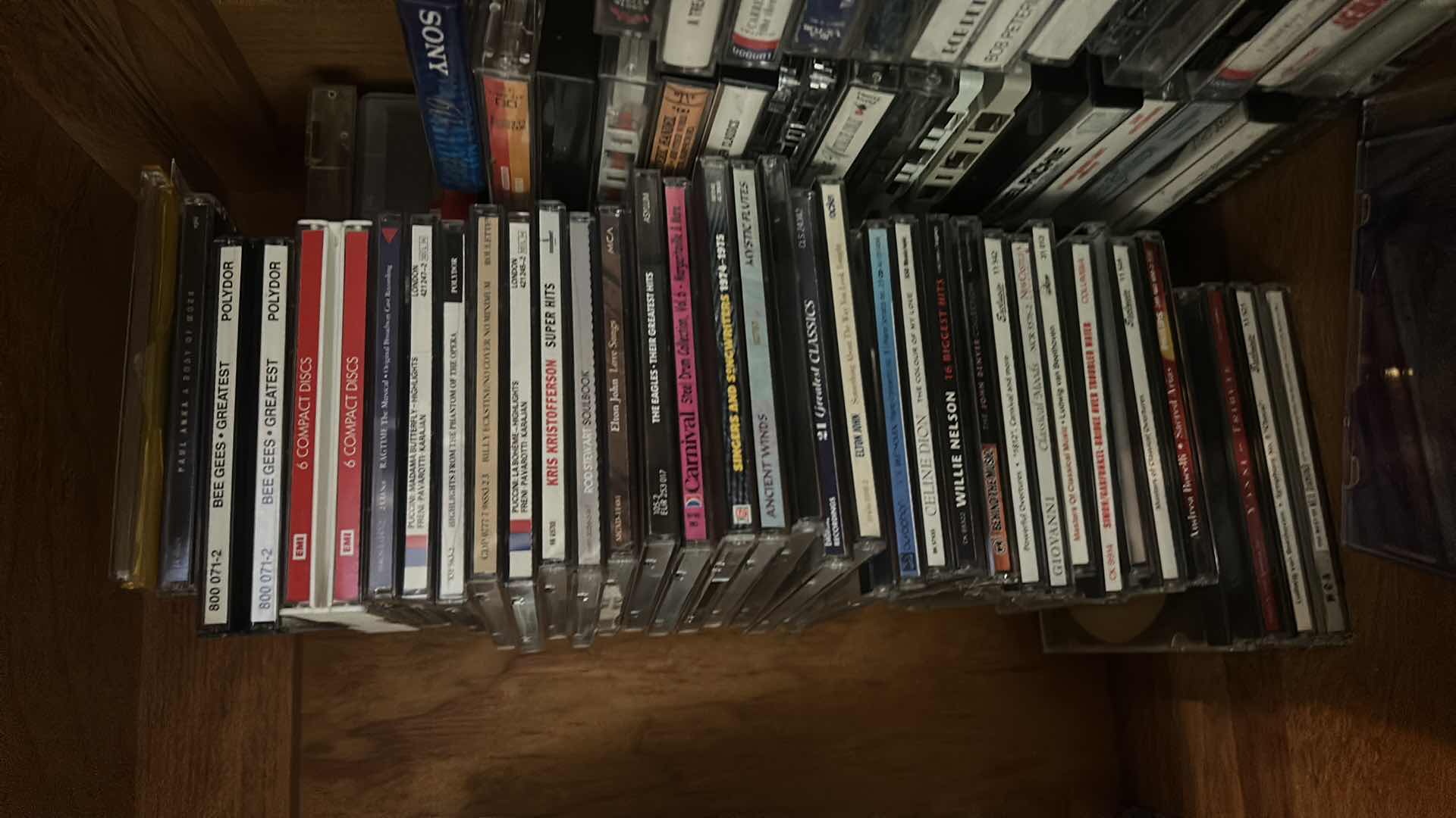 Photo 1 of CONTENTS OF ENTERTAINMENT CABINET: SPEAKERS, WOOFER, CD’s AND MORE