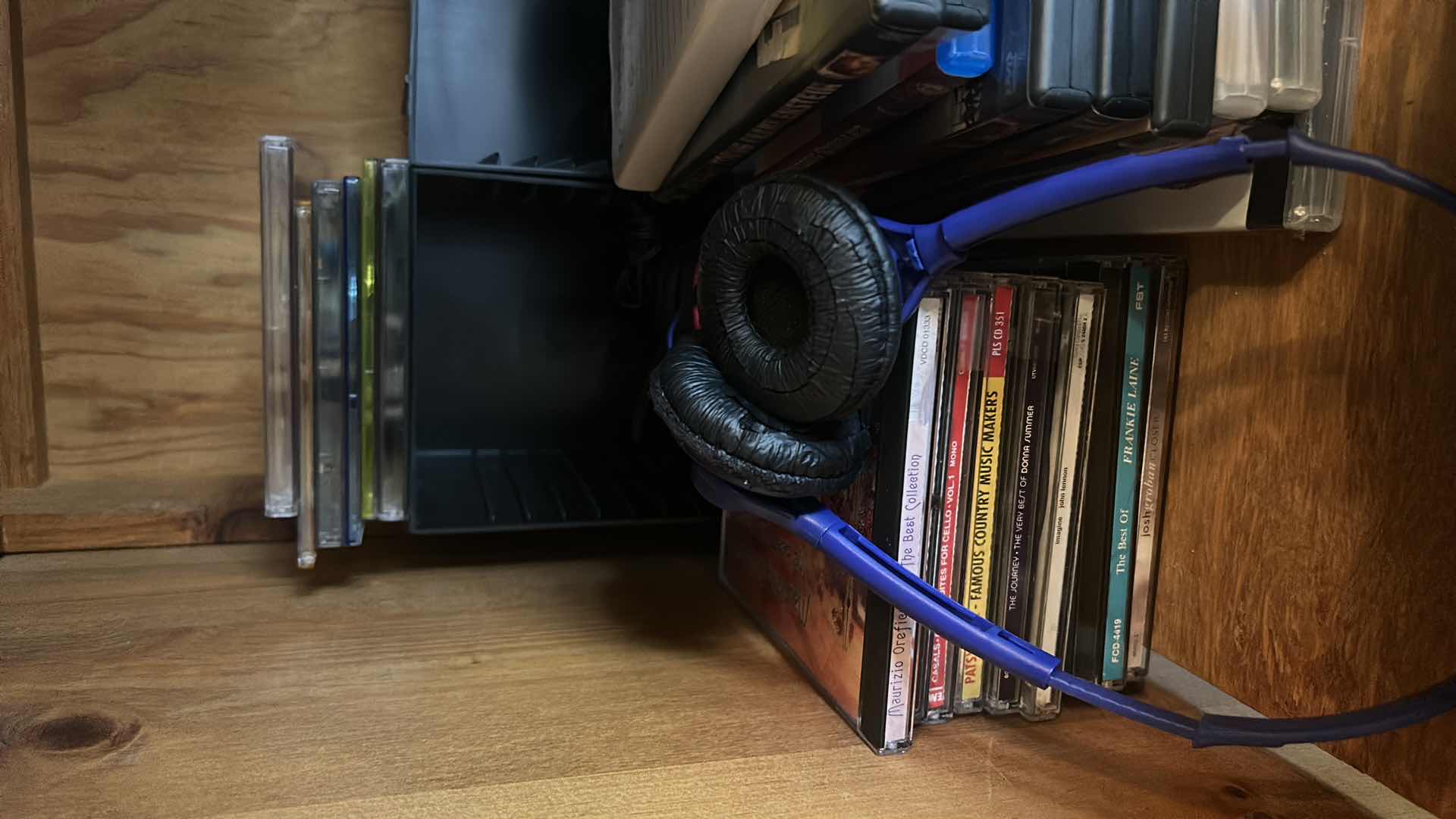 Photo 1 of CONTENTS OF ENTERTAINMENT CABINET: SPEAKERS, WOOFER, CD’s AND MORE