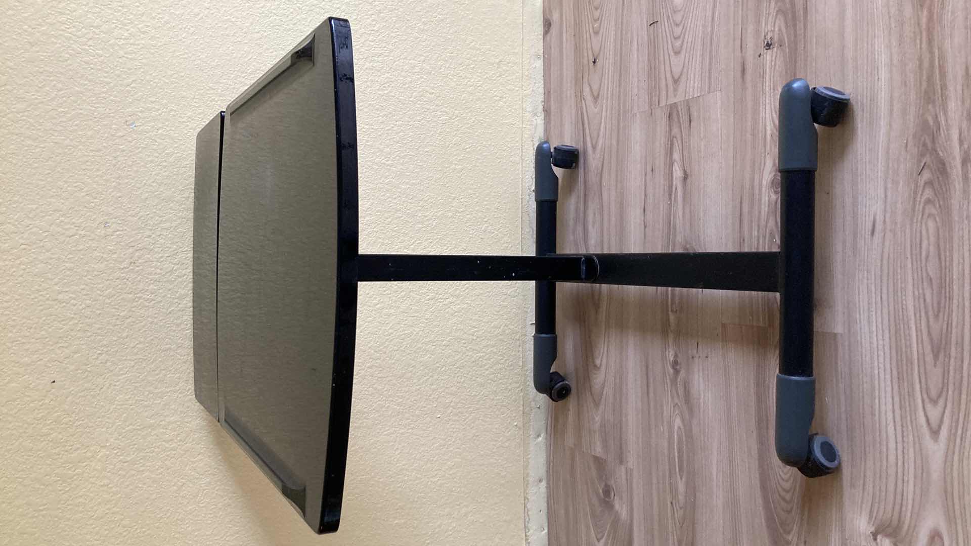 Photo 1 of ROLLING ADJUSTABLE MULTI-HEIGHT TV TRAY 28” X 26”-38”