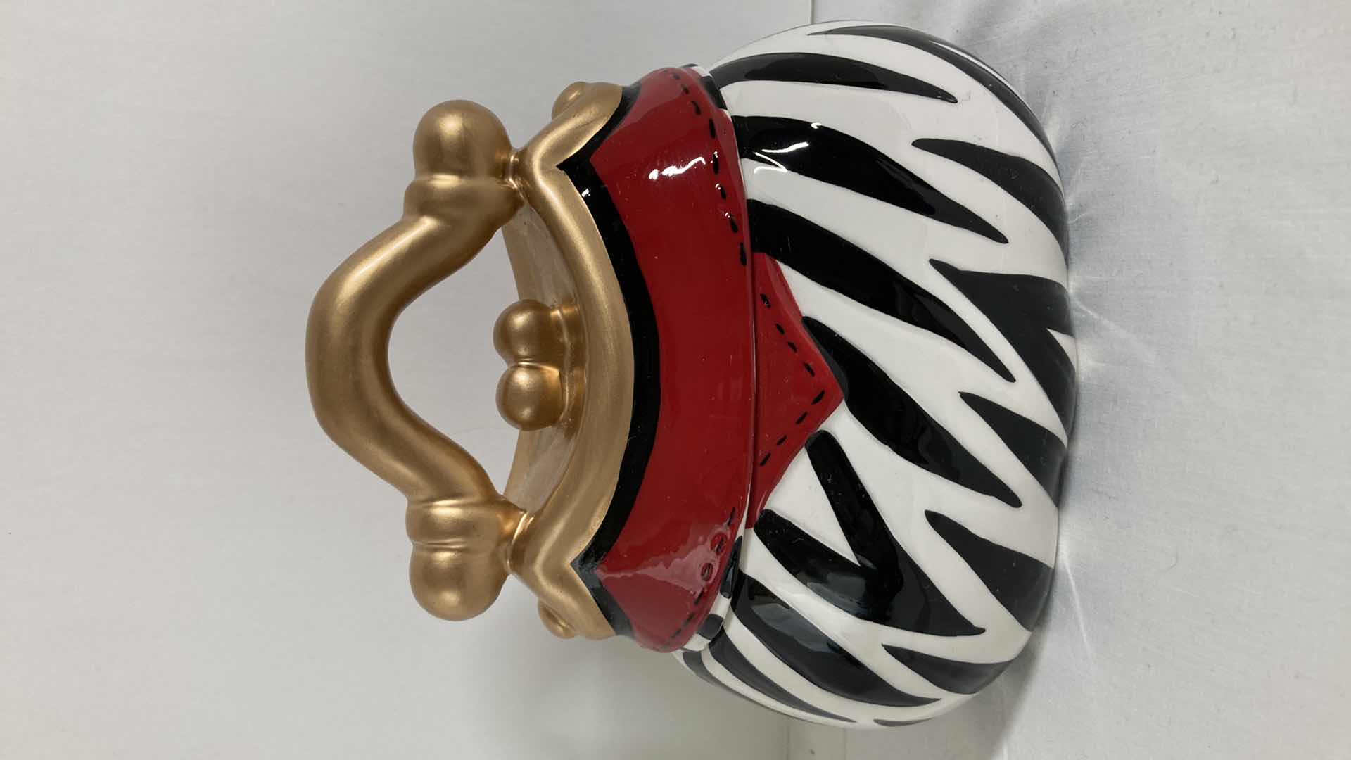 Photo 1 of DAVID’S COOKIES CERAMIC PURSE JAR 6.5” X 4.25” H6”