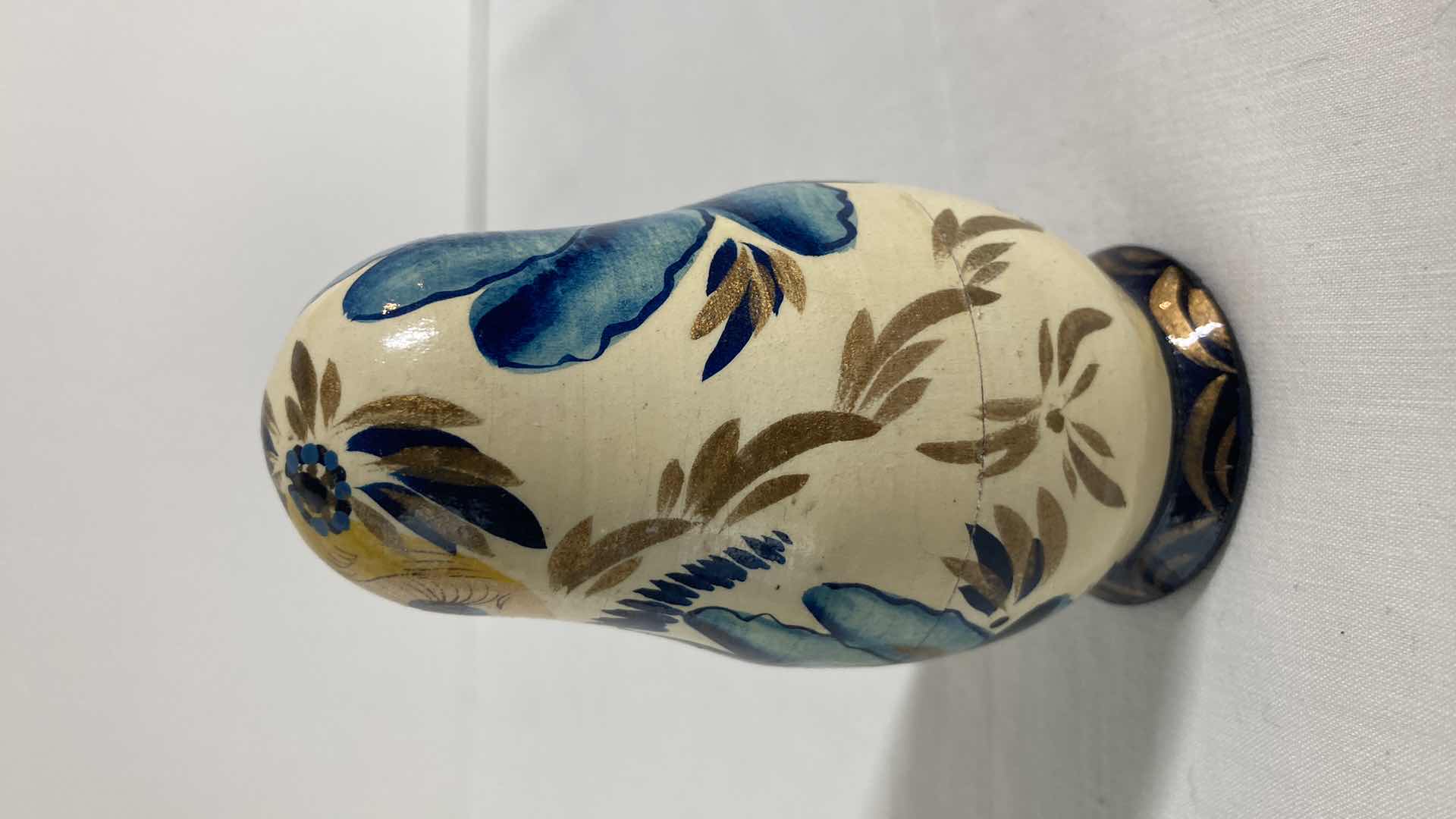 Photo 2 of HAND PAINTED NESTING DOLL H3.5