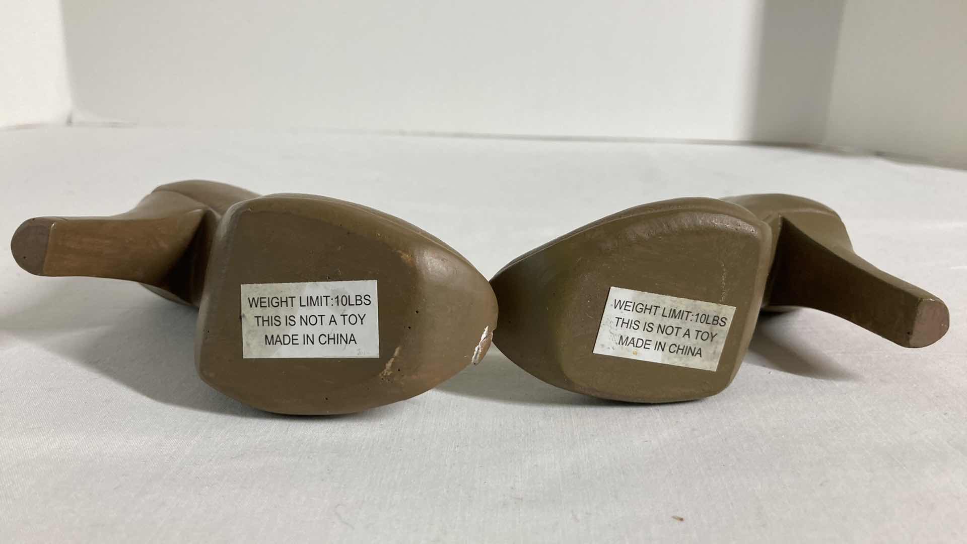 Photo 1 of VINTAGE HEEL COAT HOOKS (2) 4.5” X 4”