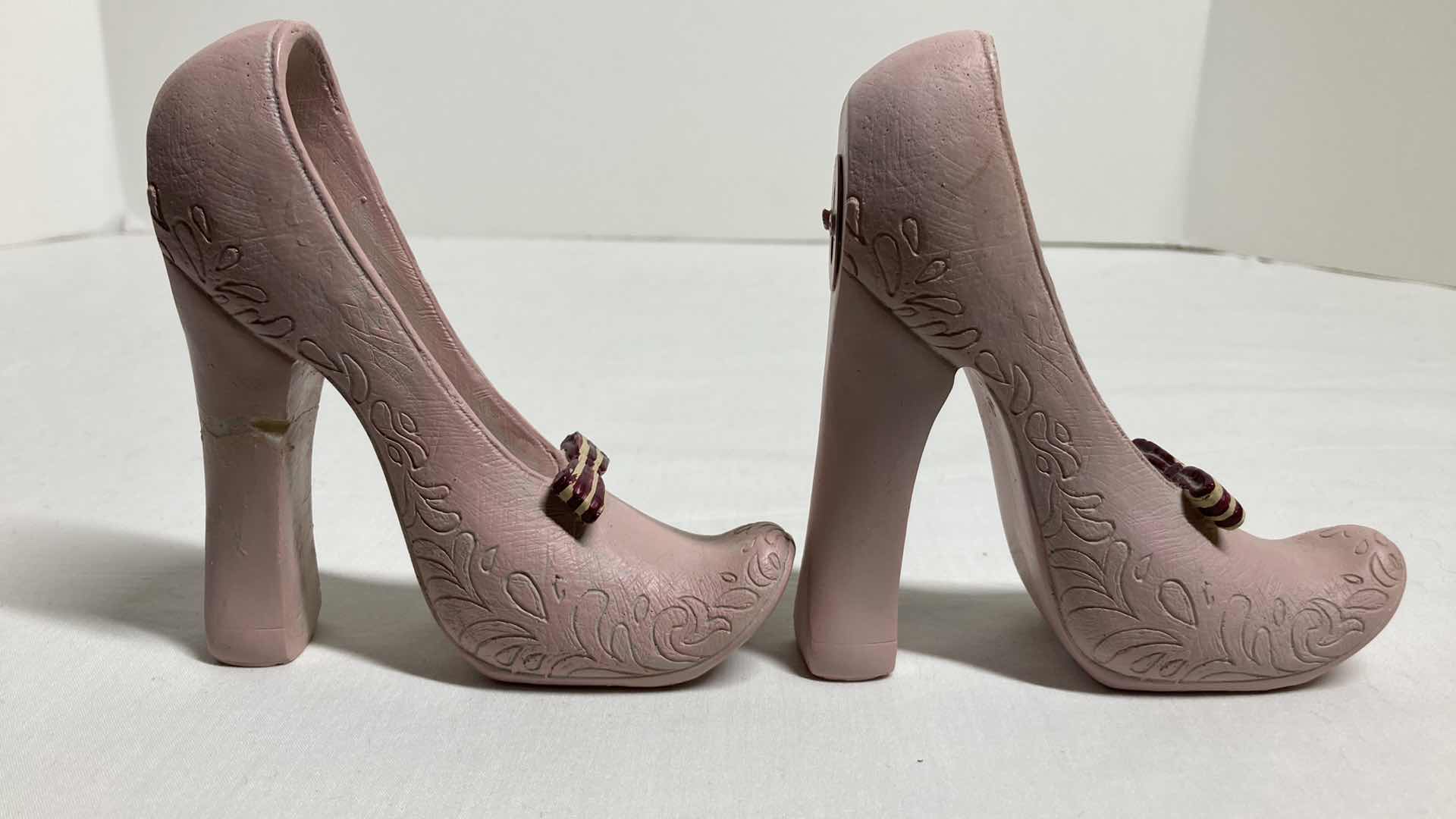 Photo 1 of VINTAGE BOWTIE HEEL COAT HOOKS (2) 4.5” X 4”