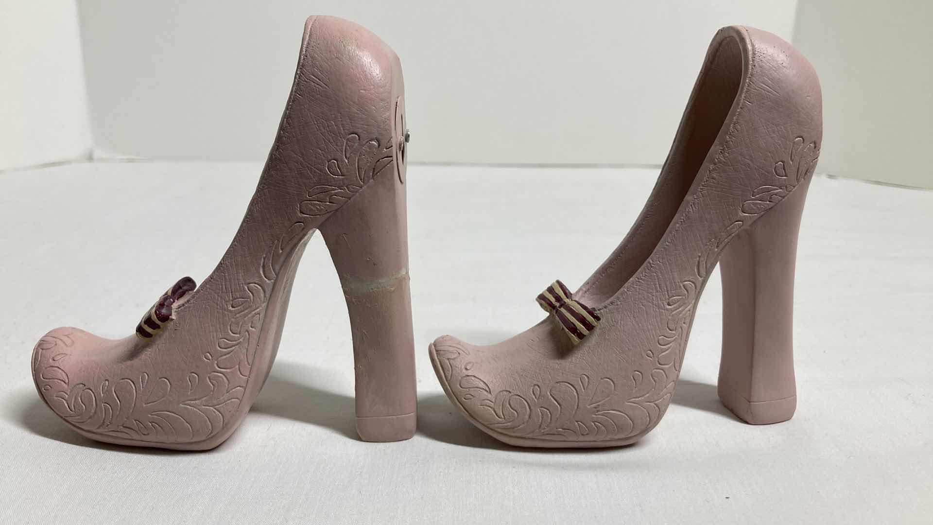 Photo 1 of VINTAGE BOWTIE HEEL COAT HOOKS (2) 4.5” X 4”