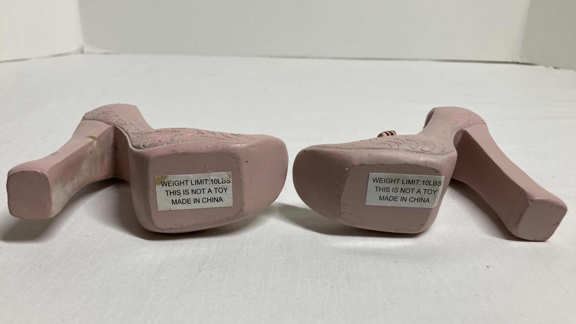 Photo 1 of VINTAGE BOWTIE HEEL COAT HOOKS (2) 4.5” X 4”