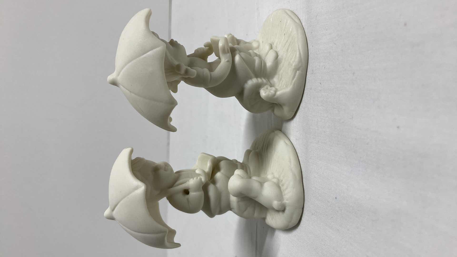 Photo 1 of JADE COLLECTION CERAMIC BOY & CERAMIC GIRL W UMBRELLA H3.5”