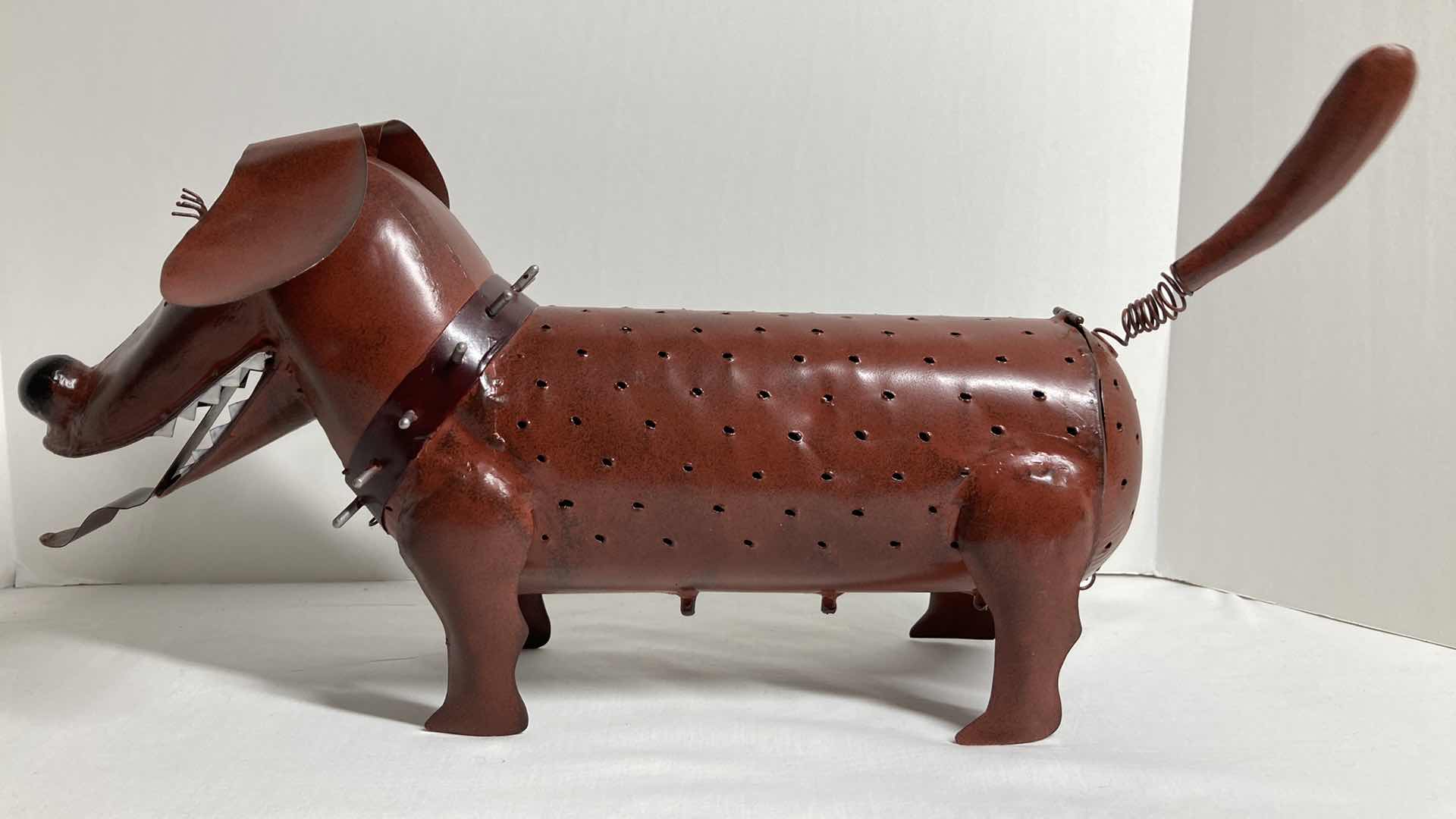 Photo 1 of BLUE HANDWORKS SPIKE DACHSHUND CANDLE HOLDER 8.5” X 21” H10.5”