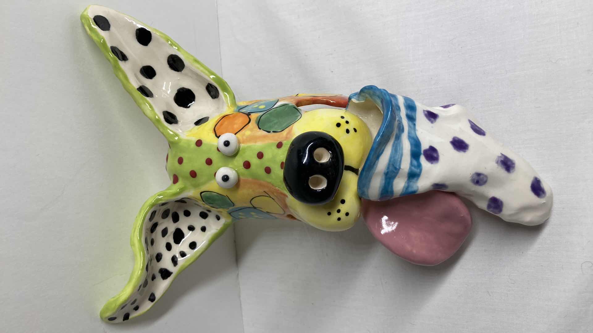 Photo 1 of ABSTRACT MULTI COLOR CERAMIC DOG MASK BY DOTTIE DRACOS 6.75” X 10”