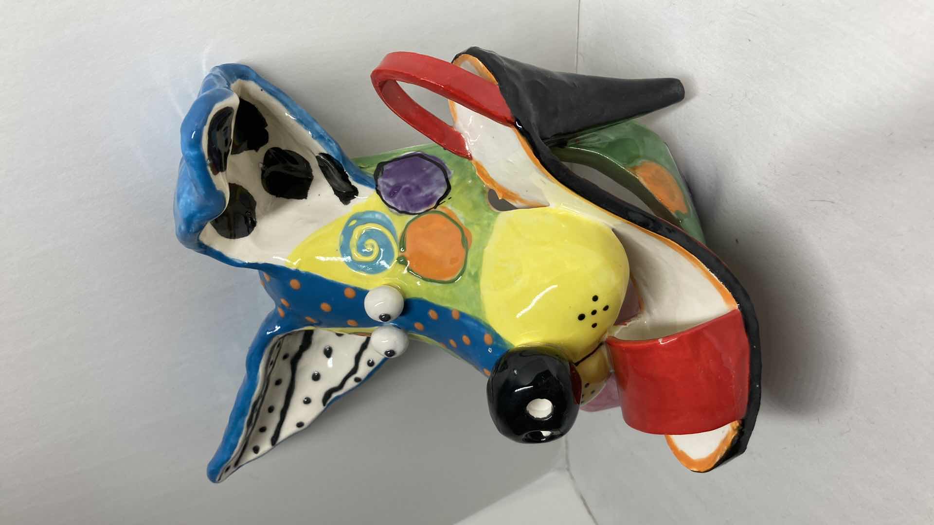 Photo 1 of ABSTRACT MULTI COLOR CERAMIC DOG MASK BY DOTTIE DRACOS 9.25” X 9.5”