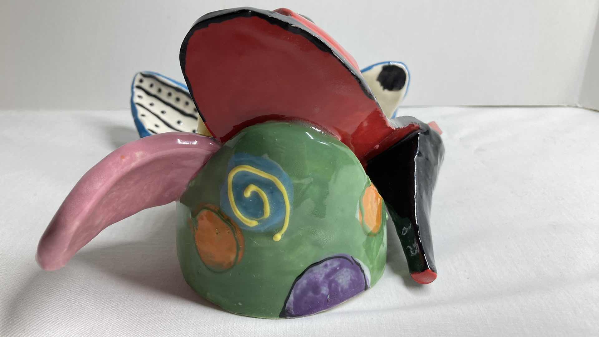 Photo 1 of ABSTRACT MULTI COLOR CERAMIC DOG MASK BY DOTTIE DRACOS 9.25” X 9.5”