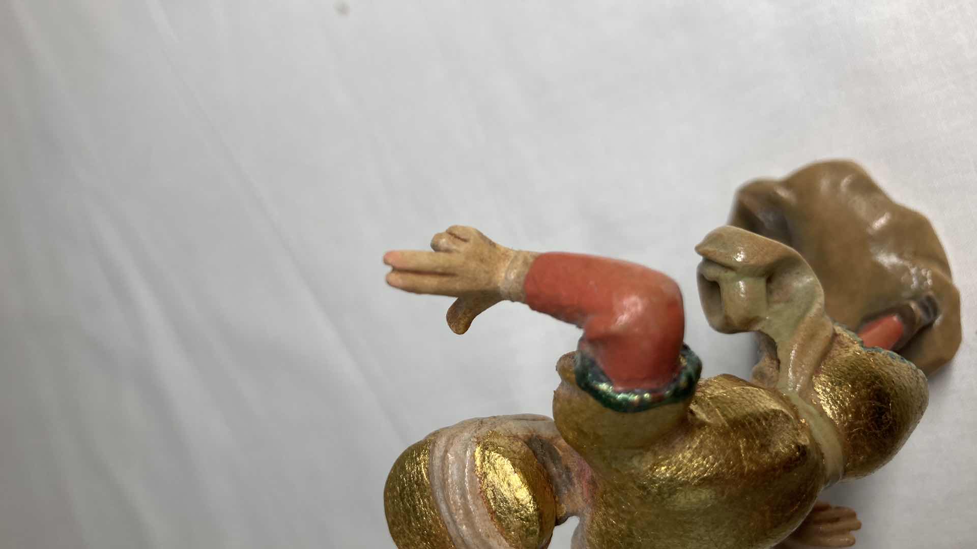 Photo 1 of DANCING HAND PAINTED WOOD CARVED FIGURINE 2” X 3.5”