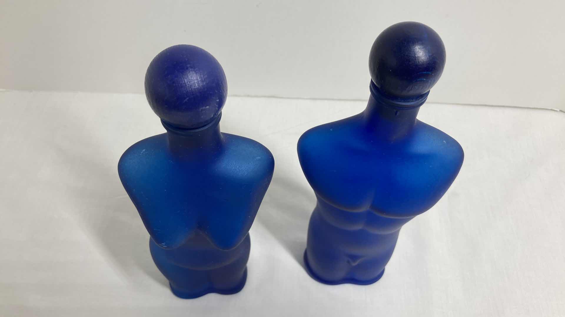 Photo 1 of MALE & FEMALE BODY BLUE FROSTED GLASS DECANTERS (2) 3” X 8.75”